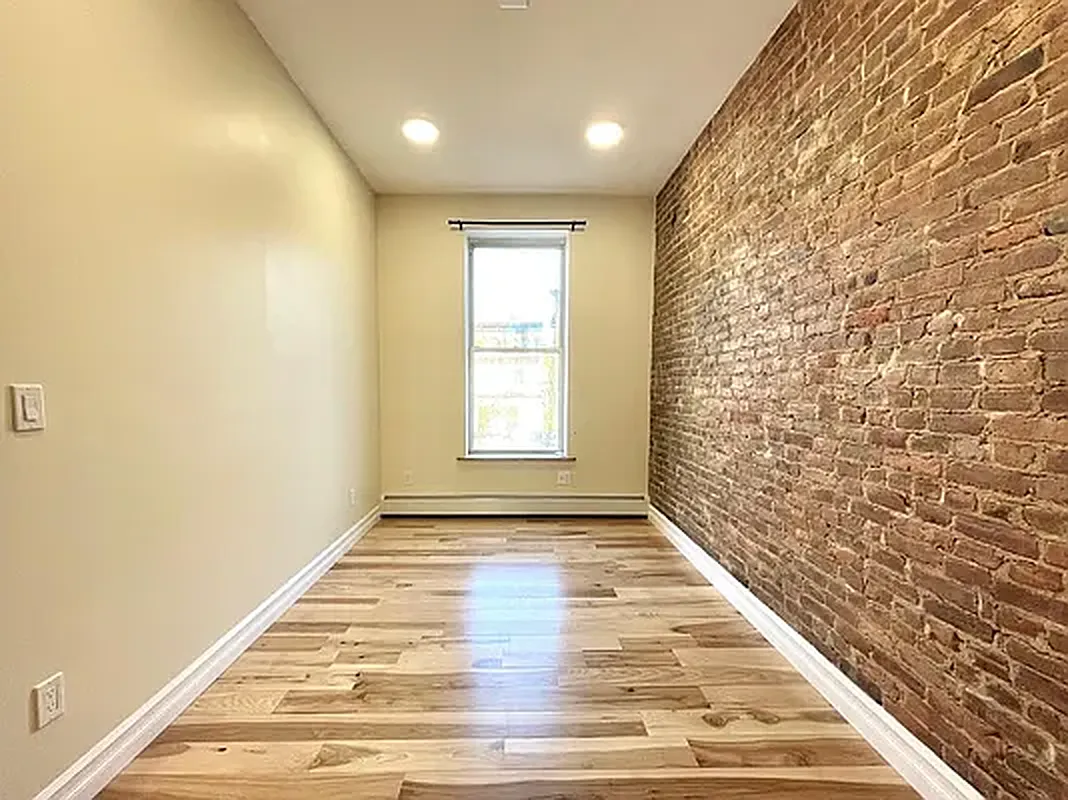 1120 Greene Avenue, Unit 1 Brooklyn, NY 11221 - Photo 6 of 13 a view of an empty room and window