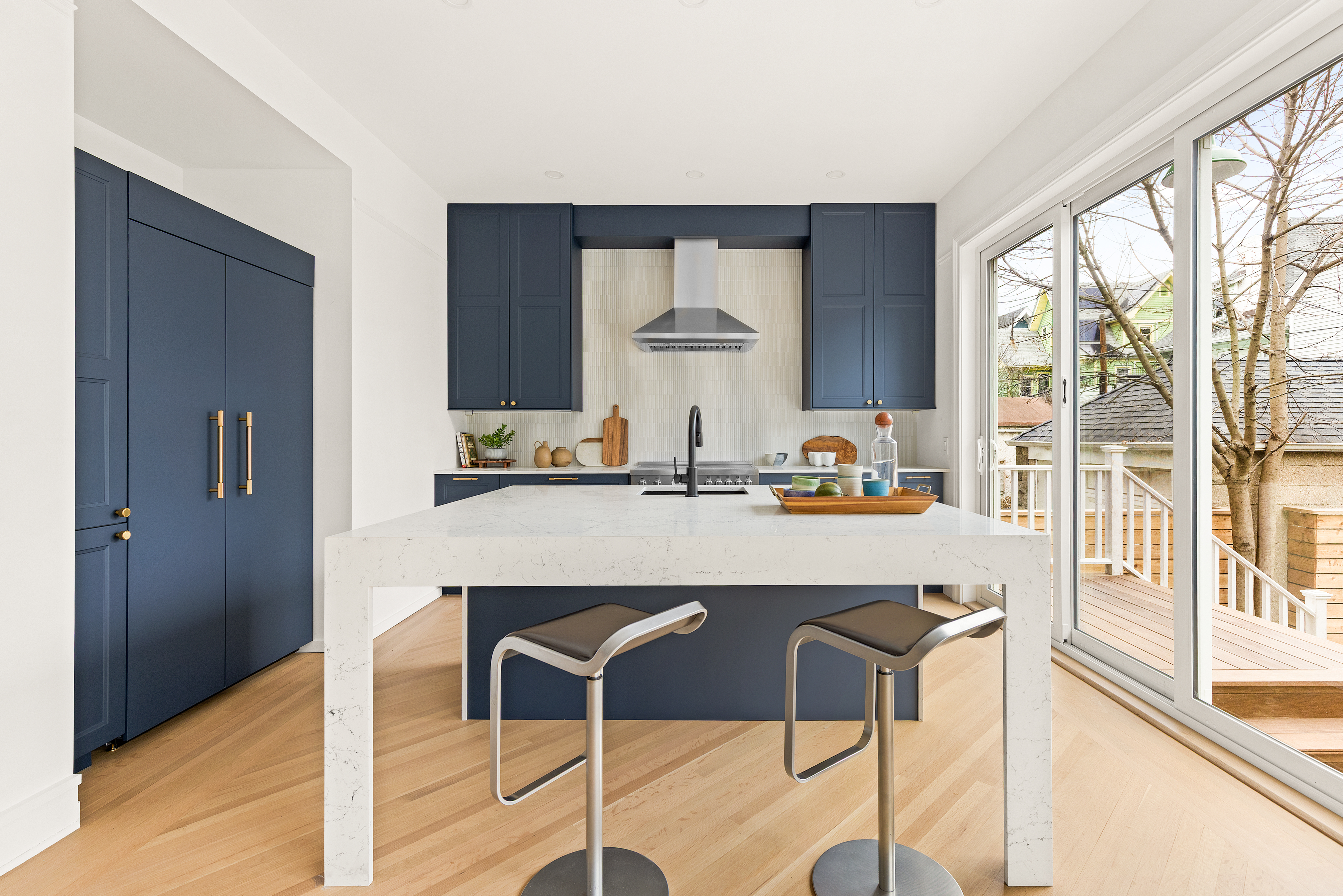 467 Rugby Road Brooklyn, NY 11226 - Photo 5 of 22 a kitchen with a window and chairs