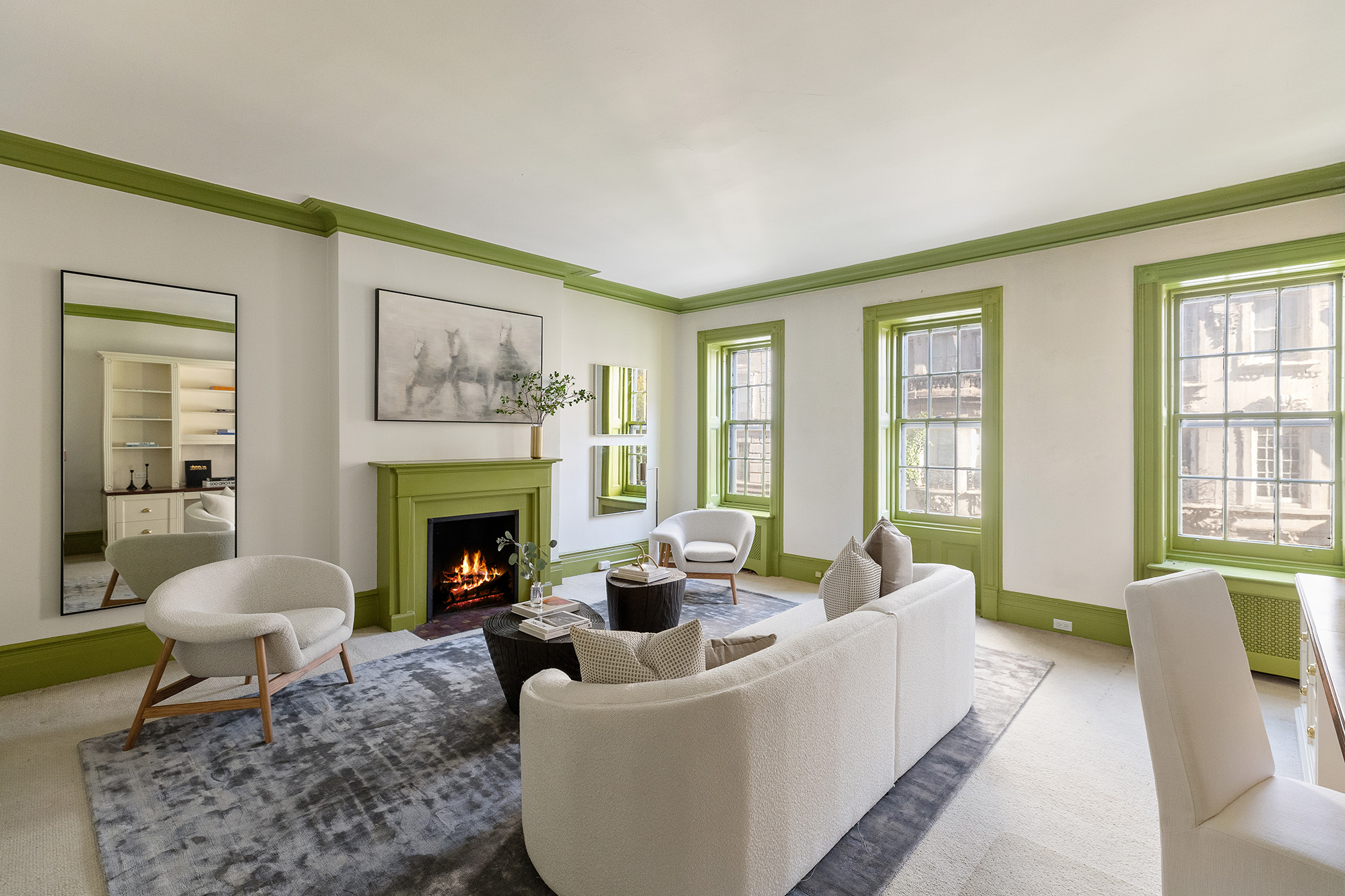 10 East 82nd Street Manhattan, NY 10028 - Photo 6 of 22 a living room with furniture and a fireplace
