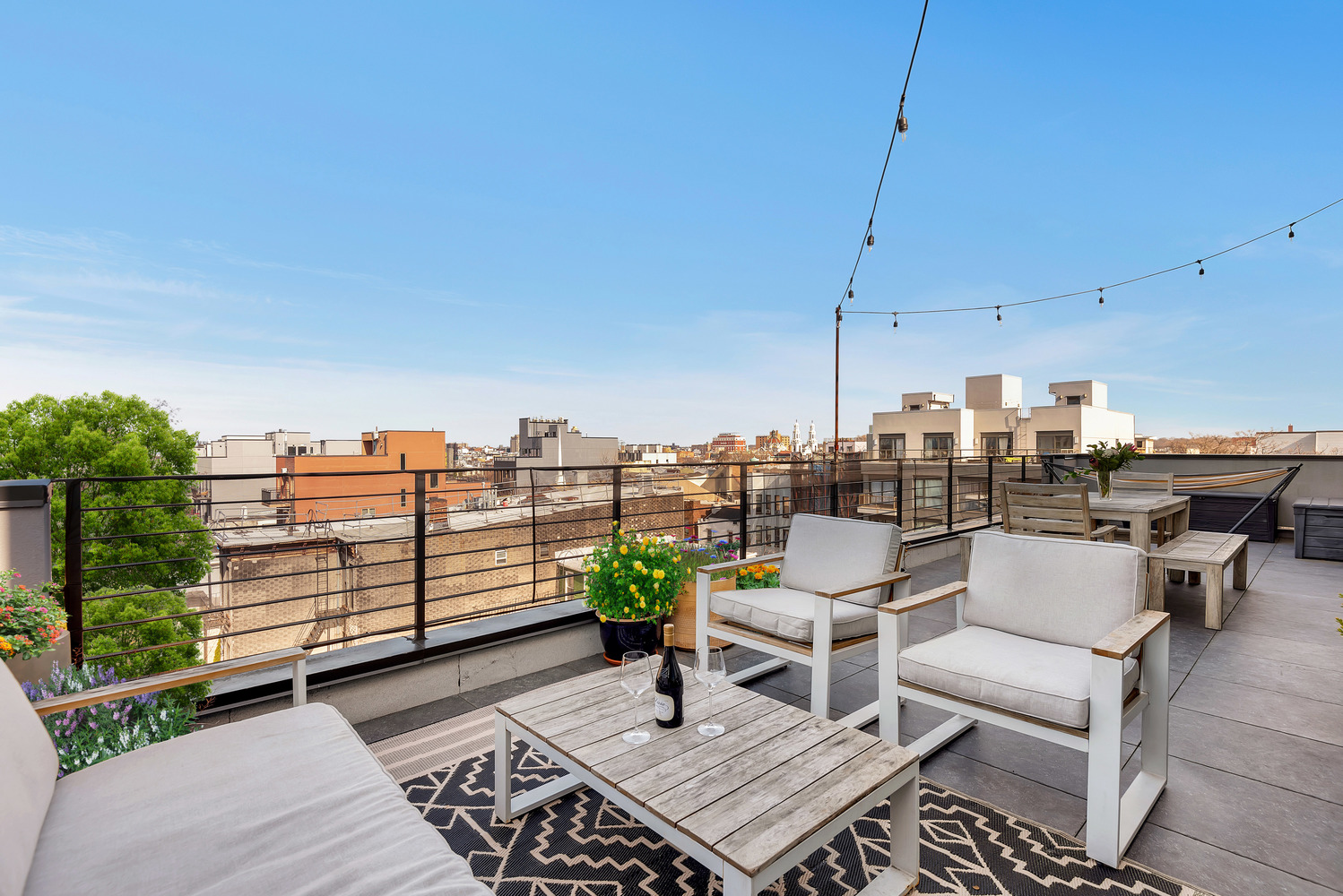 267 Evergreen Avenue, Unit PH Brooklyn, NY 11221 - Photo 3 of 19 a view of a terrace with furniture