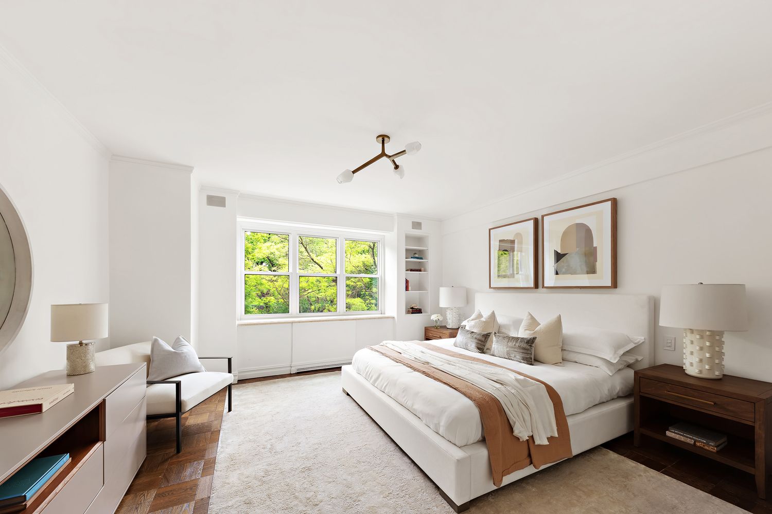 900 5th Avenue, Unit 4B Manhattan, NY 10021 - Photo 6 of 14 a bedroom with a bed and a window