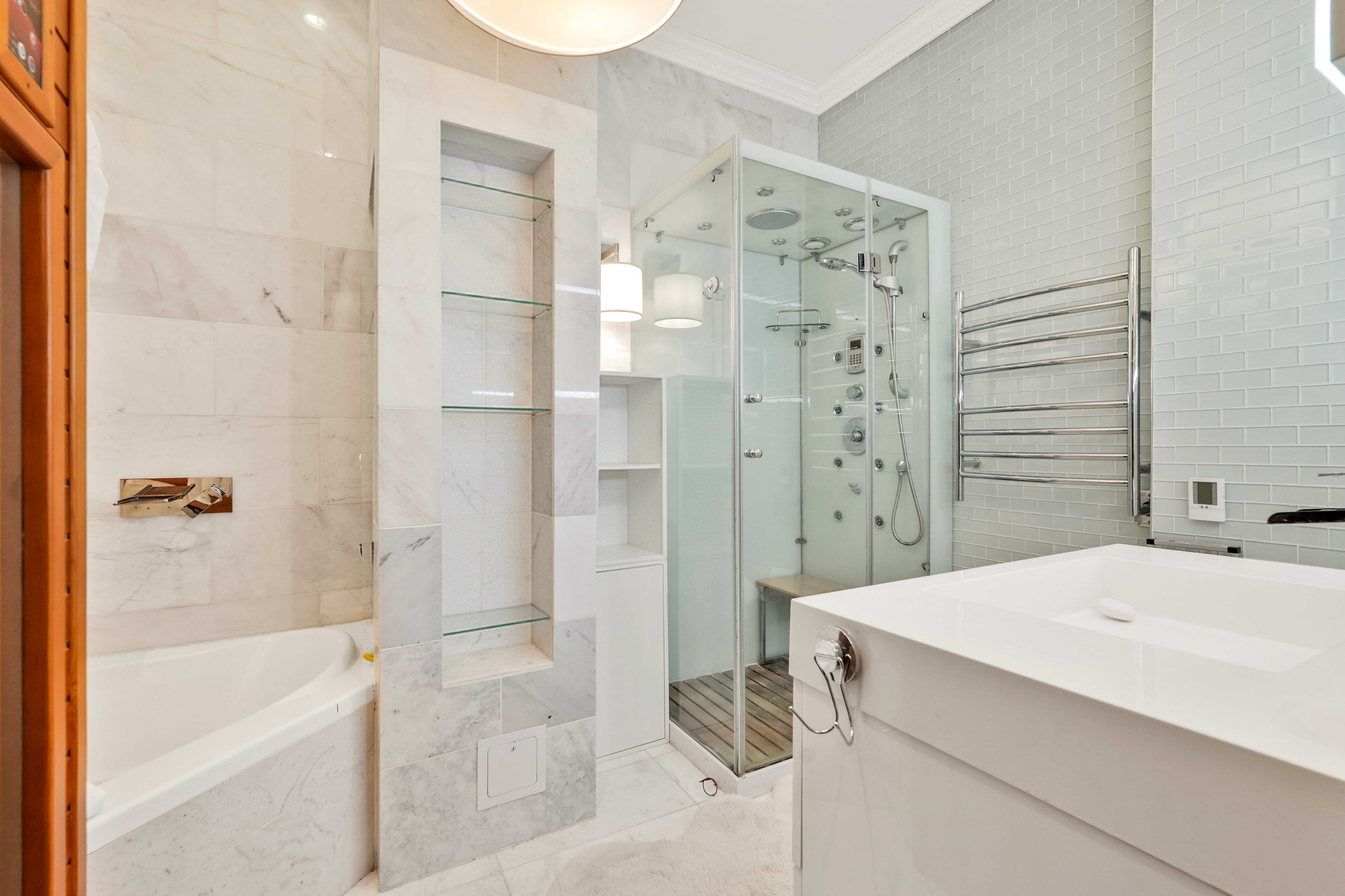 288 St James Place, Unit TRIPLEX Brooklyn, NY 11238 - Photo 16 of 25 a bathroom with a bathtub and a shower