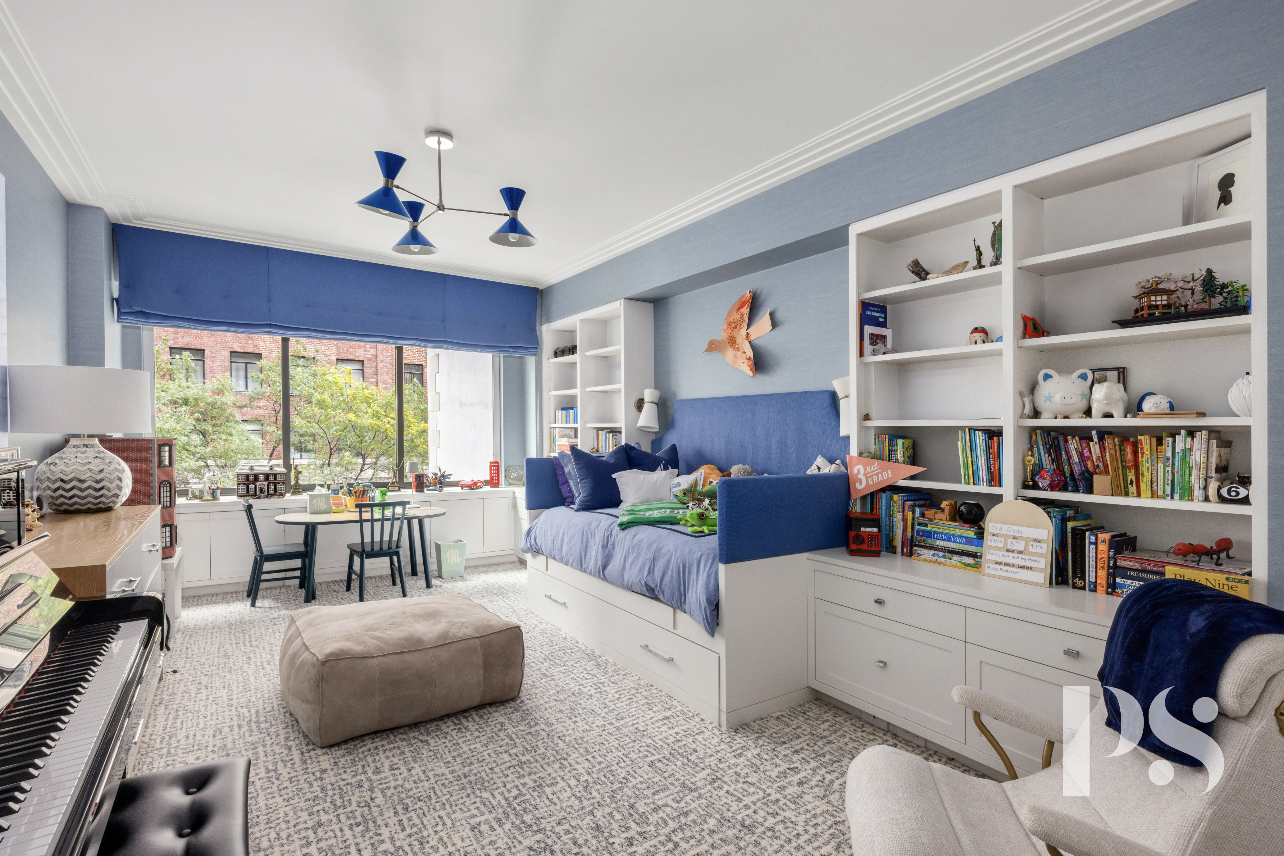 733 Park Avenue, Unit 4 Manhattan, NY 10021 - Photo 24 of 29 a living room with furniture and a large window