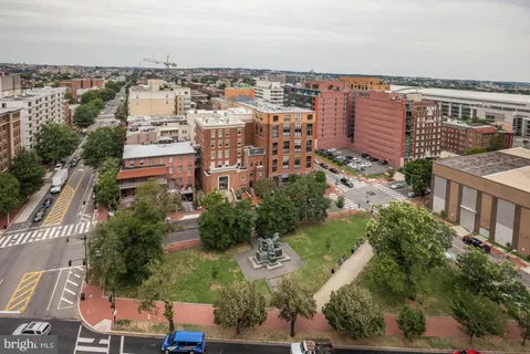 a view of a city with tall buildings