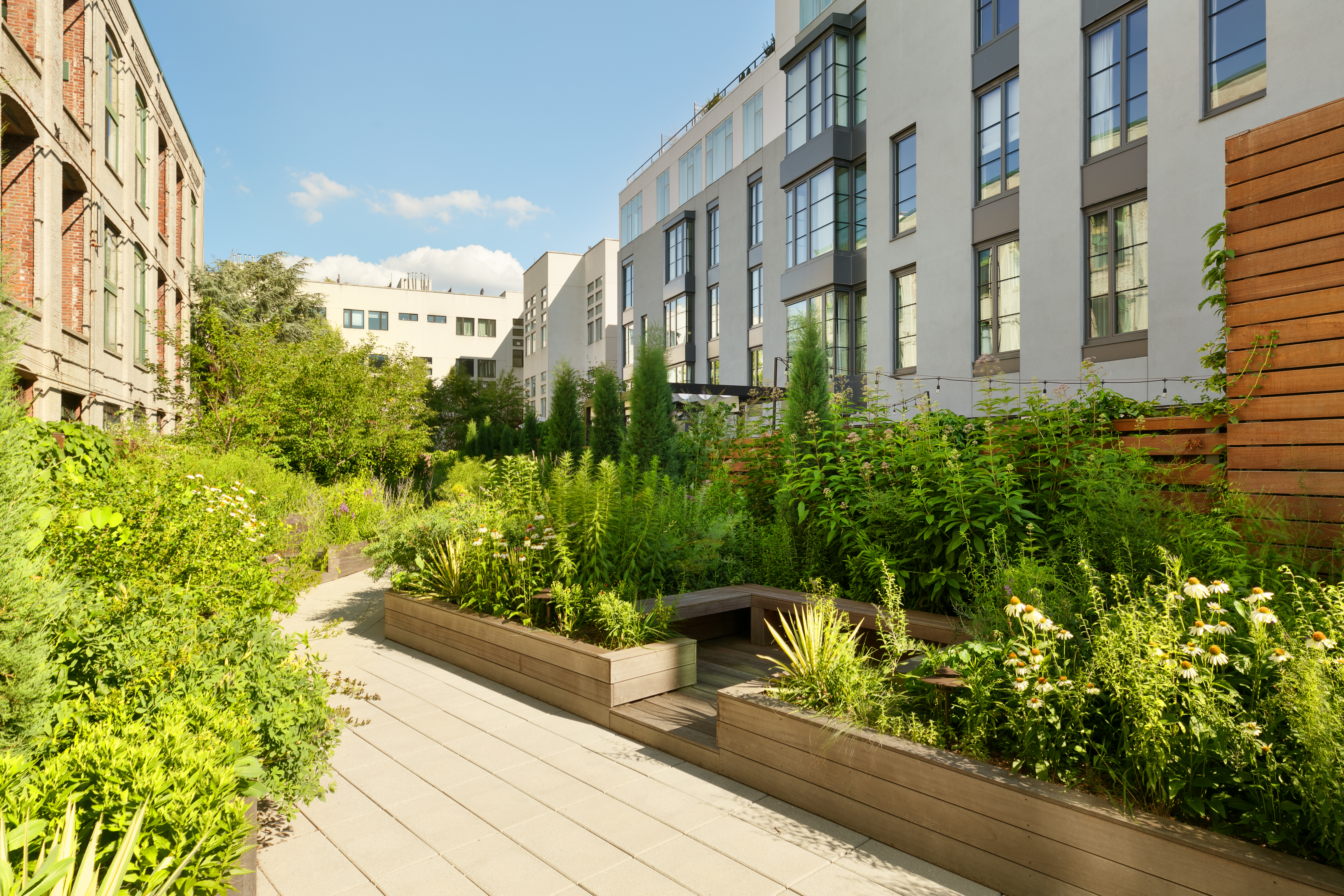 345 Carroll Street, Unit 3F Brooklyn, NY 11231 - Photo 12 of 14 a view of a garden with pathway