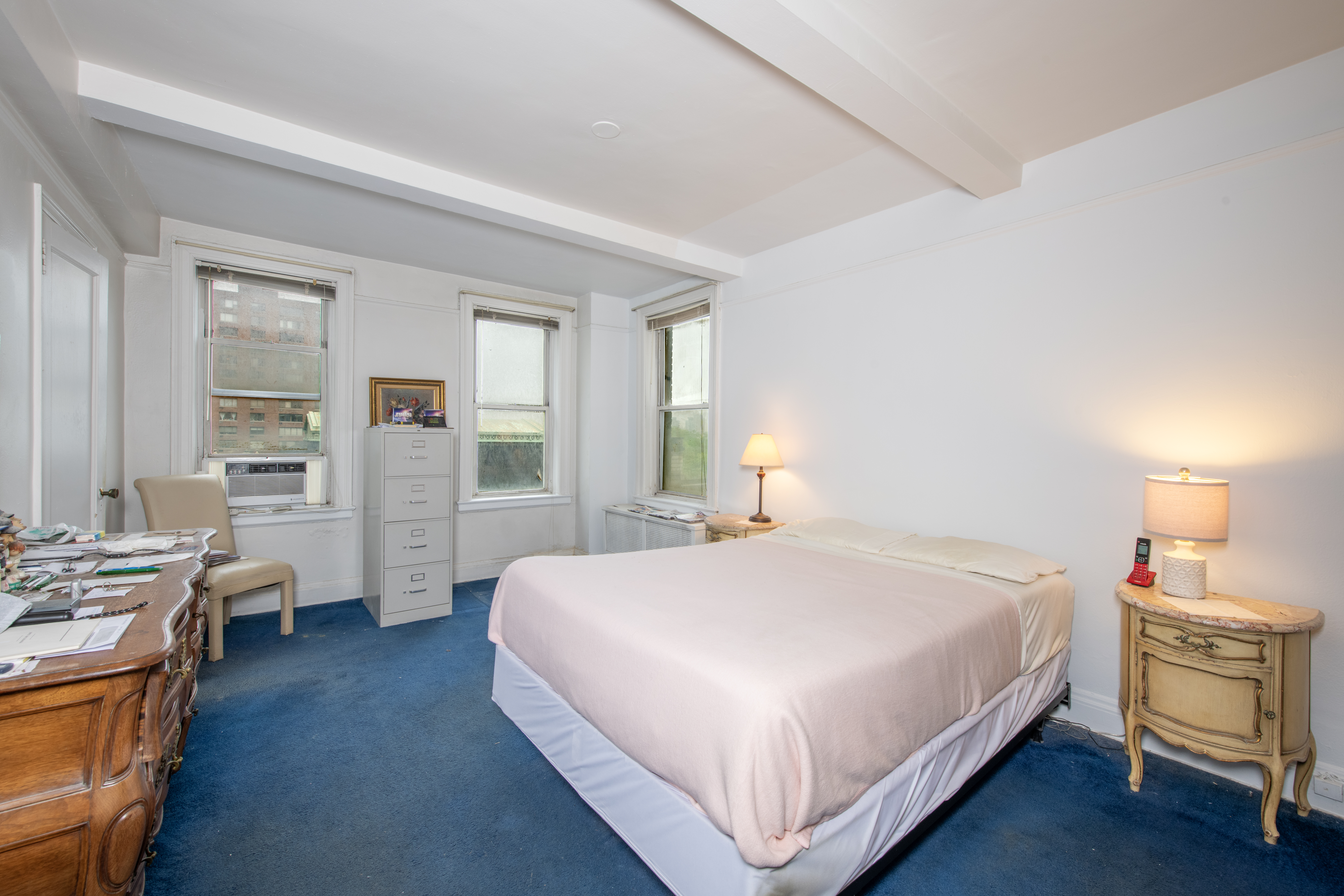 12 West 96th Street, Unit 9A Manhattan, NY 10025 - Photo 4 of 9 a bedroom with a bed and a view of bedroom