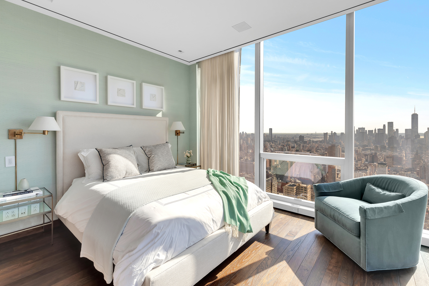 23 East 22nd Street, Unit PH Manhattan, NY 10010 - Photo 14 of 32 a bedroom with a bed and a couch next to a window