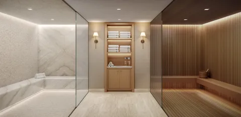 a bathroom with a bathtub and a shower