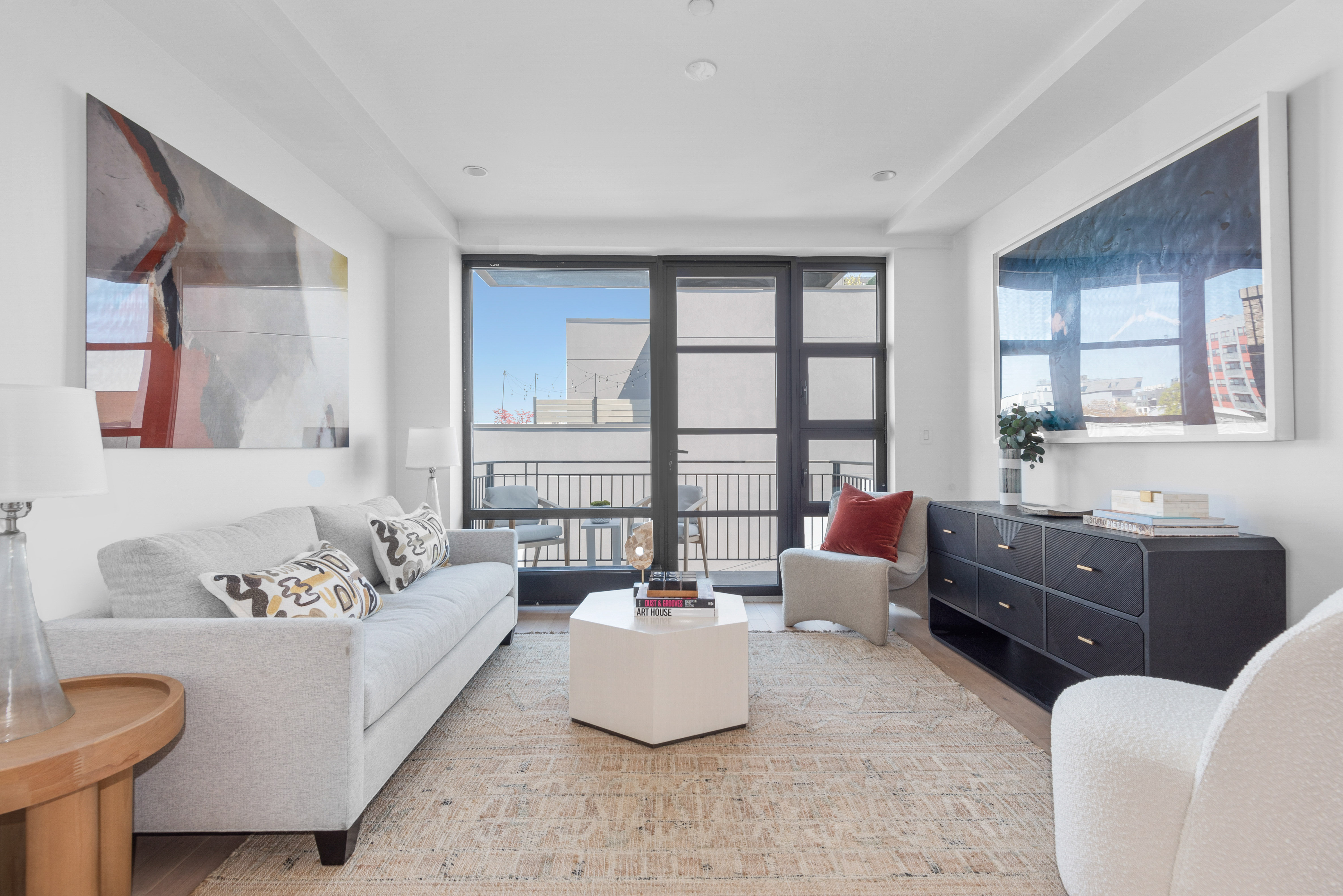 476 Union Avenue, Unit PH5A Brooklyn, NY 11211 - Photo 3 of 17 a living room with furniture and windows
