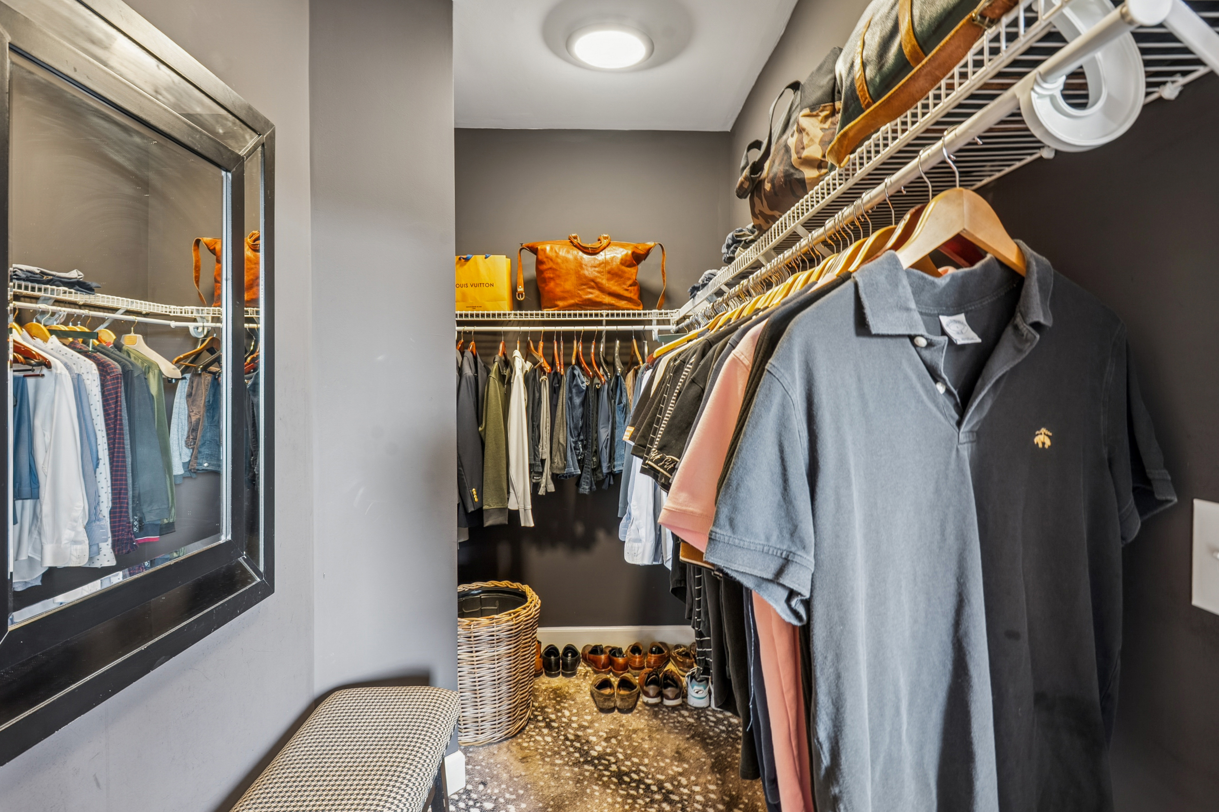 2626 Peachtree Road, Unit 1108 Atlanta, GA 30305 - Photo 12 of 25 a view of walk in closet with clothes and shoes