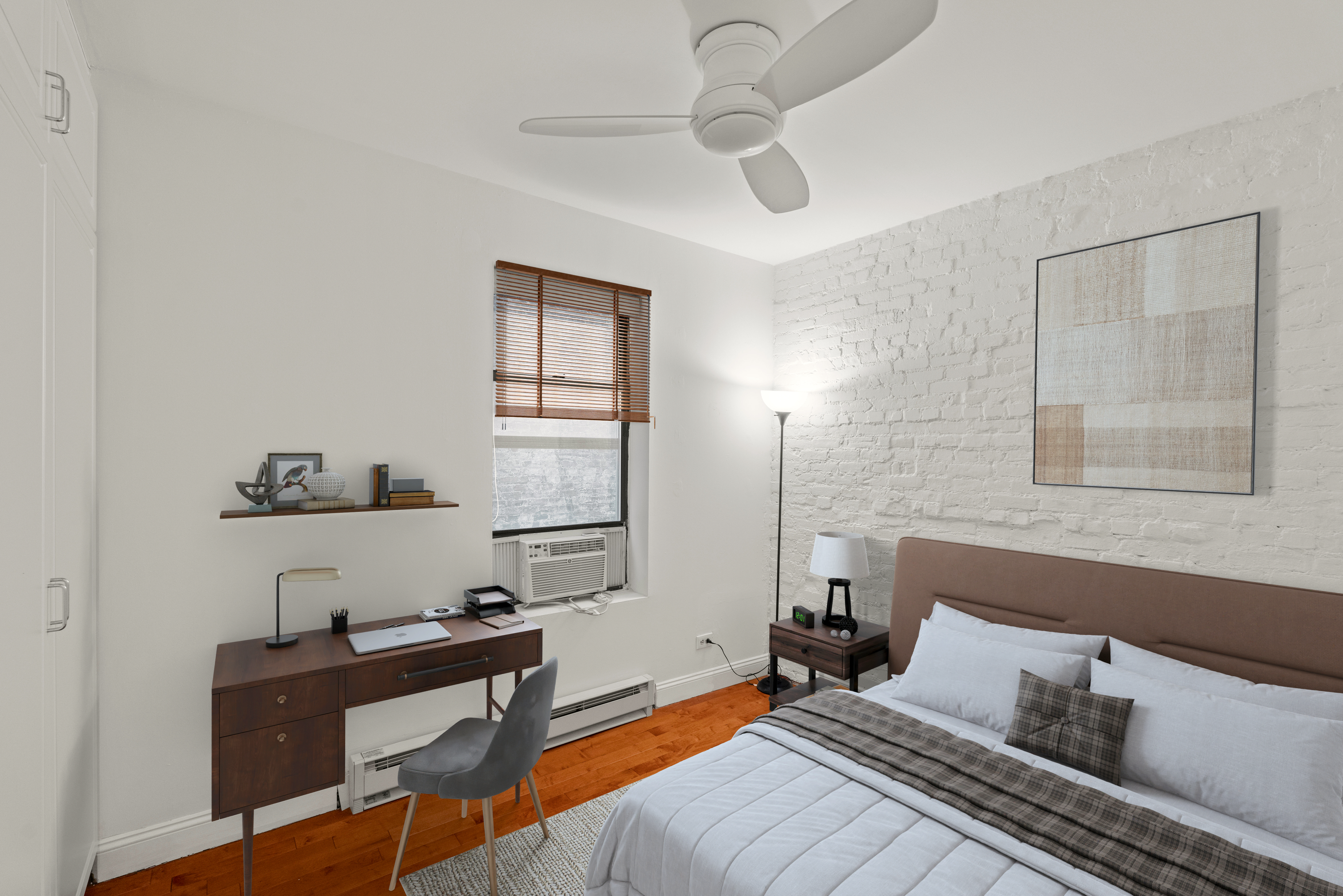 1264 Amsterdam Avenue, Unit 3D Manhattan, NY 10027 - Photo 4 of 16 a bedroom with furniture and a window