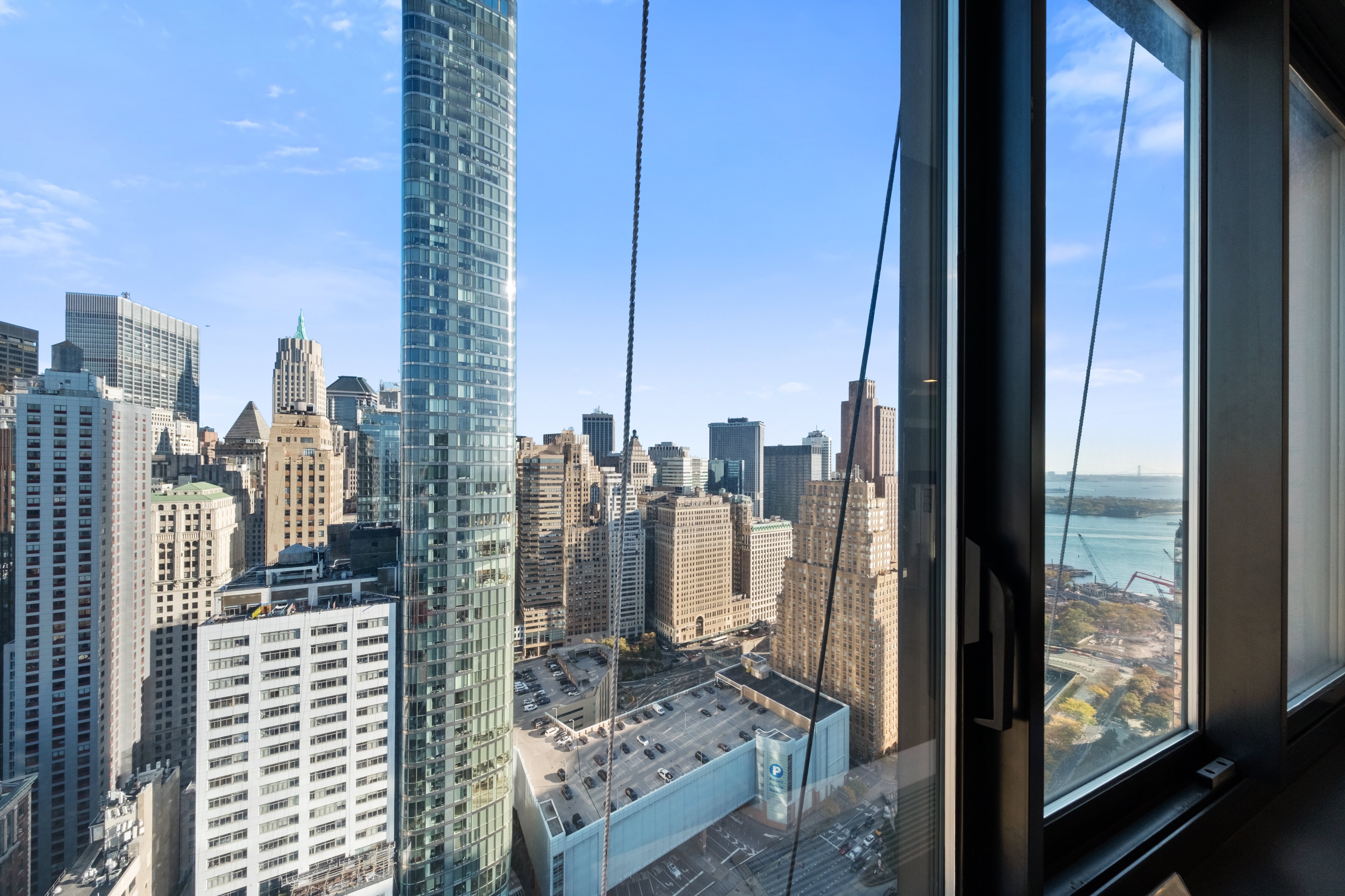 200 Rector Place, Unit 16F Manhattan, NY 10280 - Photo 12 of 25 a view of a city from a balcony