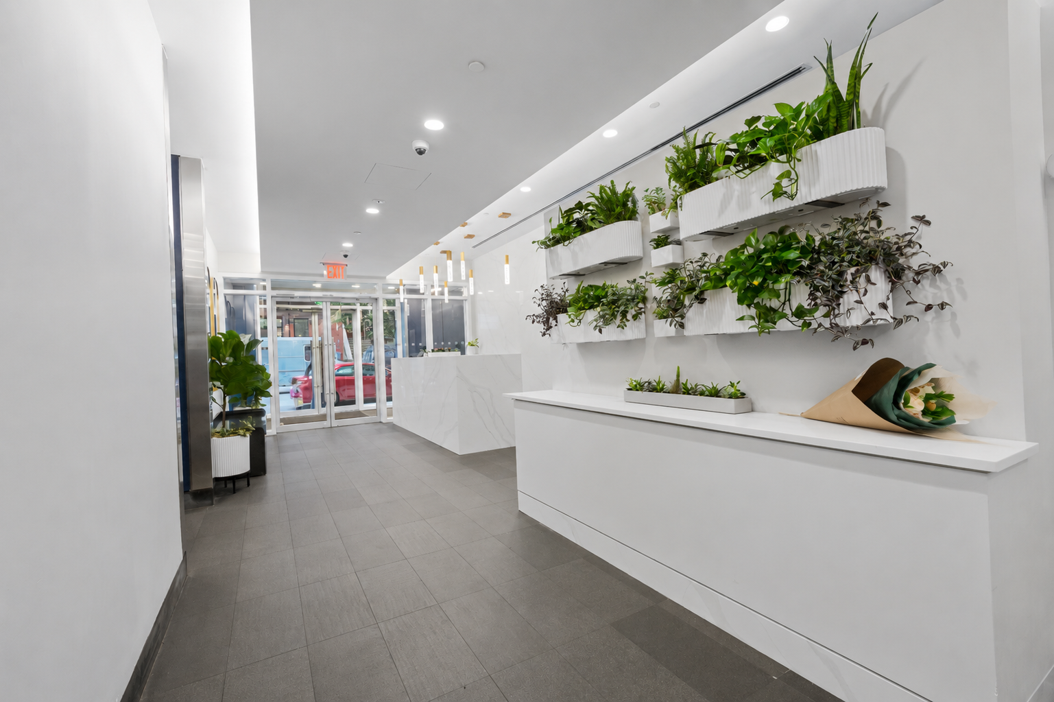 257 West 117th Street, Unit 2F Manhattan, NY 10026 - Photo 17 of 21 an entryway with a lot of flowers in it