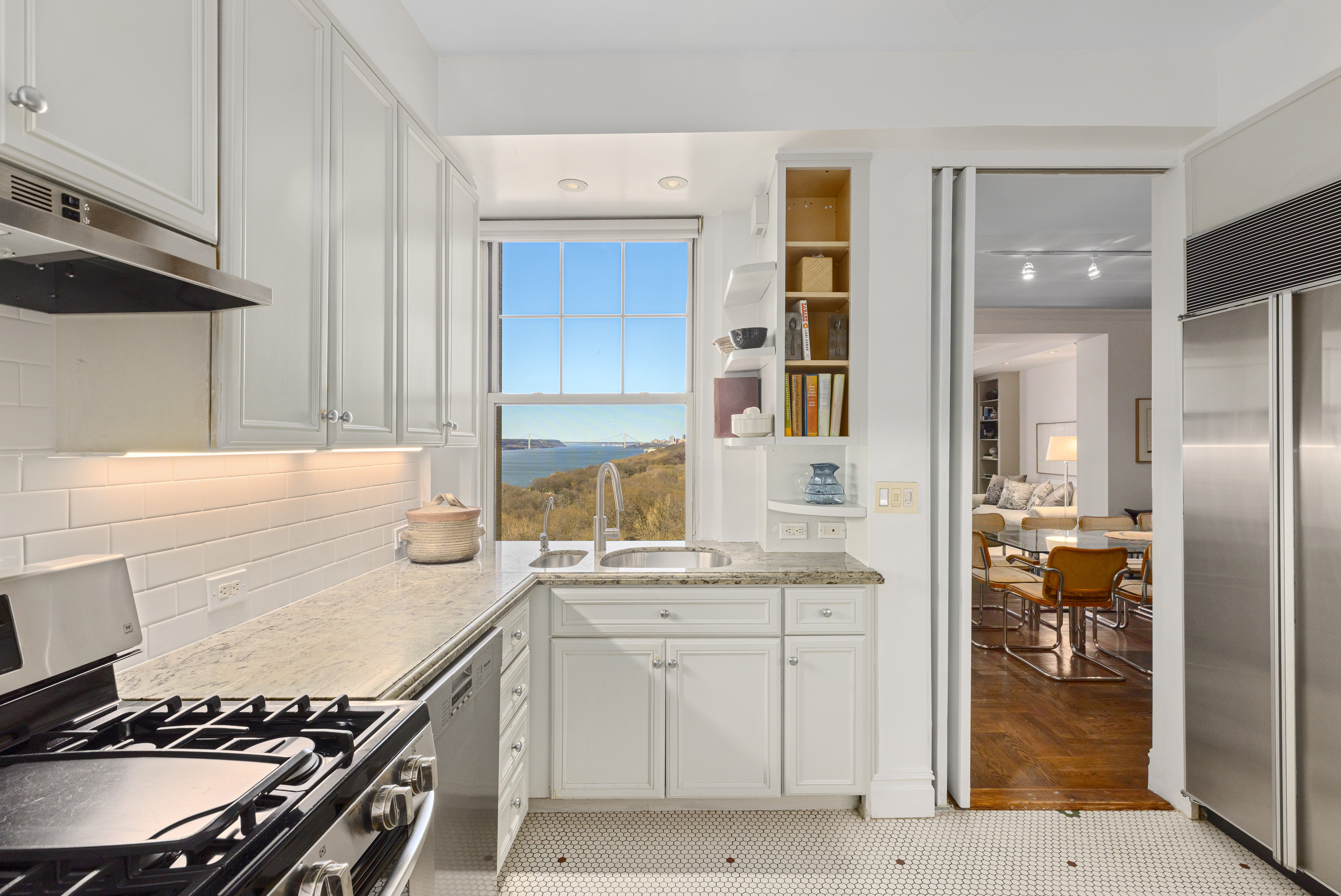 160 Riverside Drive, Unit 12D Manhattan, NY 10024 - Photo 3 of 14 a kitchen with a stove and a sink