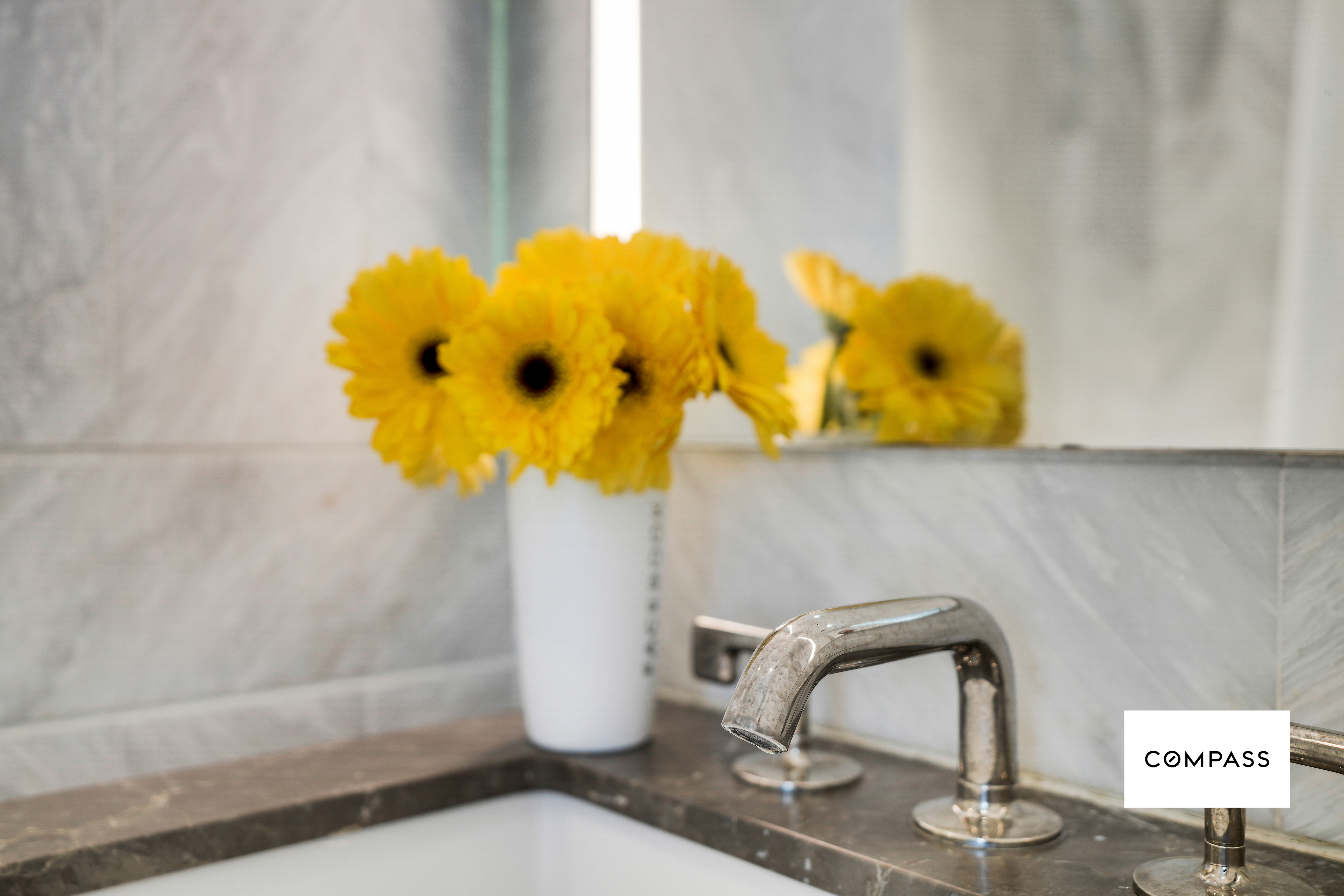 10 Nevins Street, Unit 14E Brooklyn, NY 11217 - Photo 6 of 11 a bathroom with a sink and a mirror