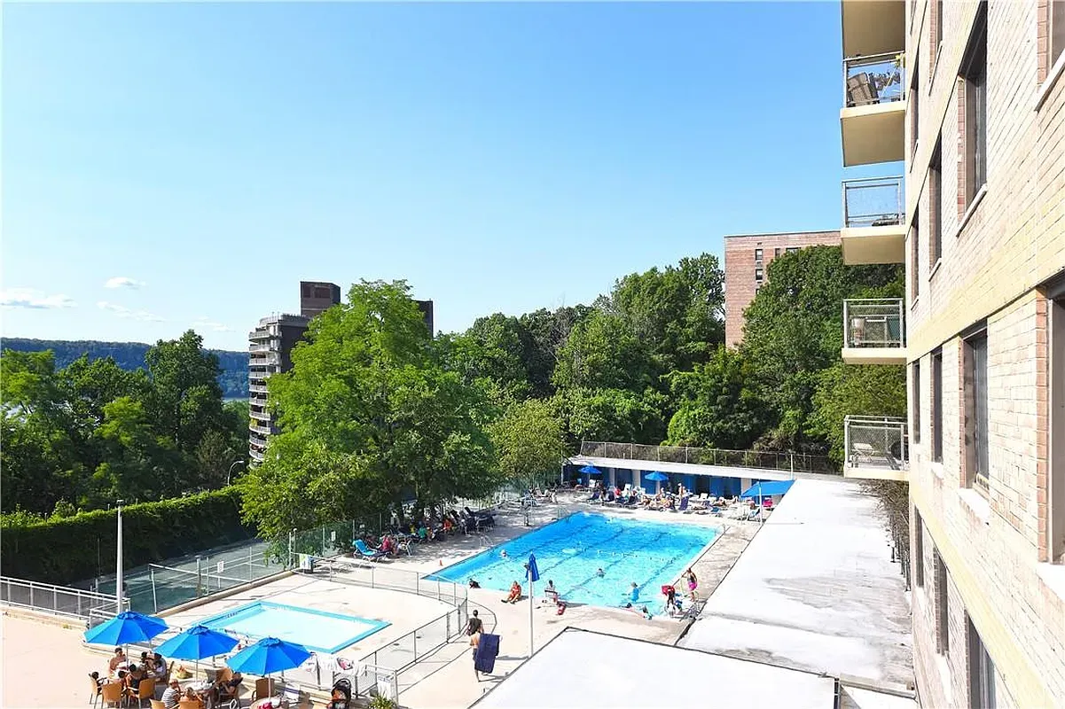 a balcony view with a garden space