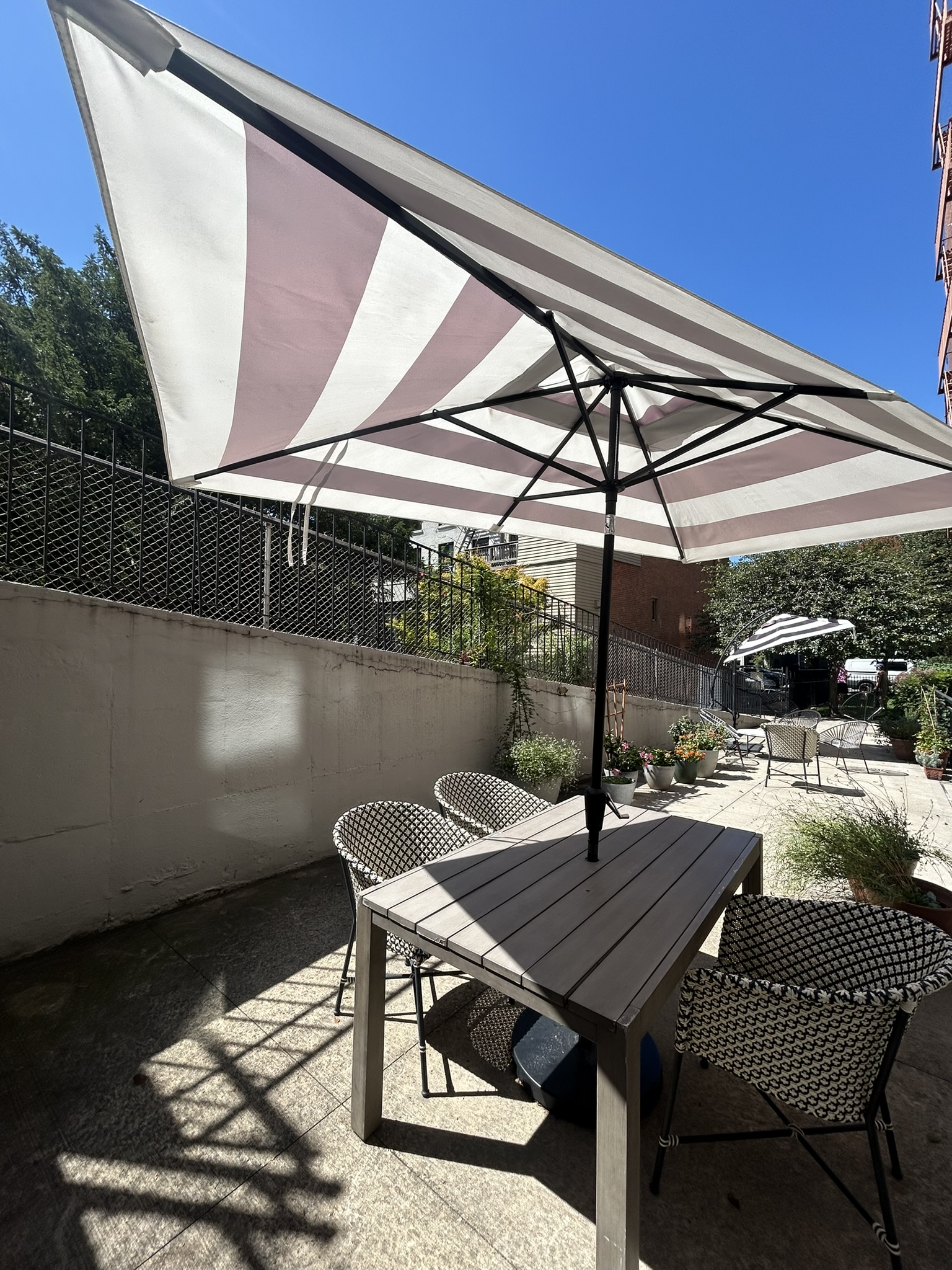 220 Congress Street, Unit 4E Brooklyn, NY 11201 - Photo 10 of 14 a patio with table and chairs