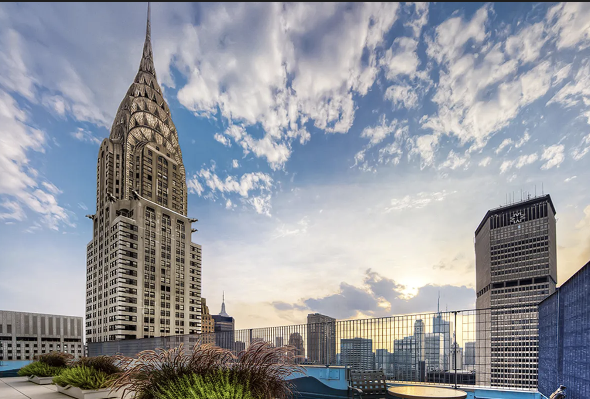 150 East 44th Street, Unit 36C Manhattan, NY 10017 - Photo 15 of 16 a view of a city with tall buildings