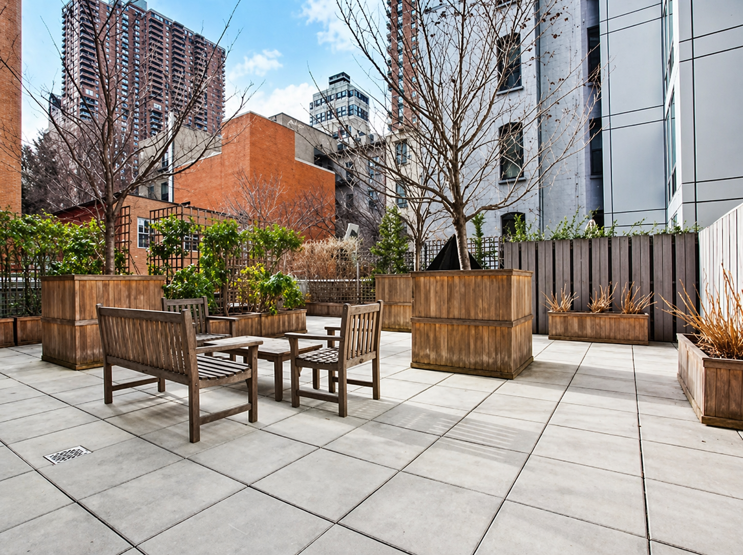 464 West 44th Street, Unit PHA Manhattan, NY 10036 - Photo 10 of 13 a view of chairs and tables in the back yard of the house