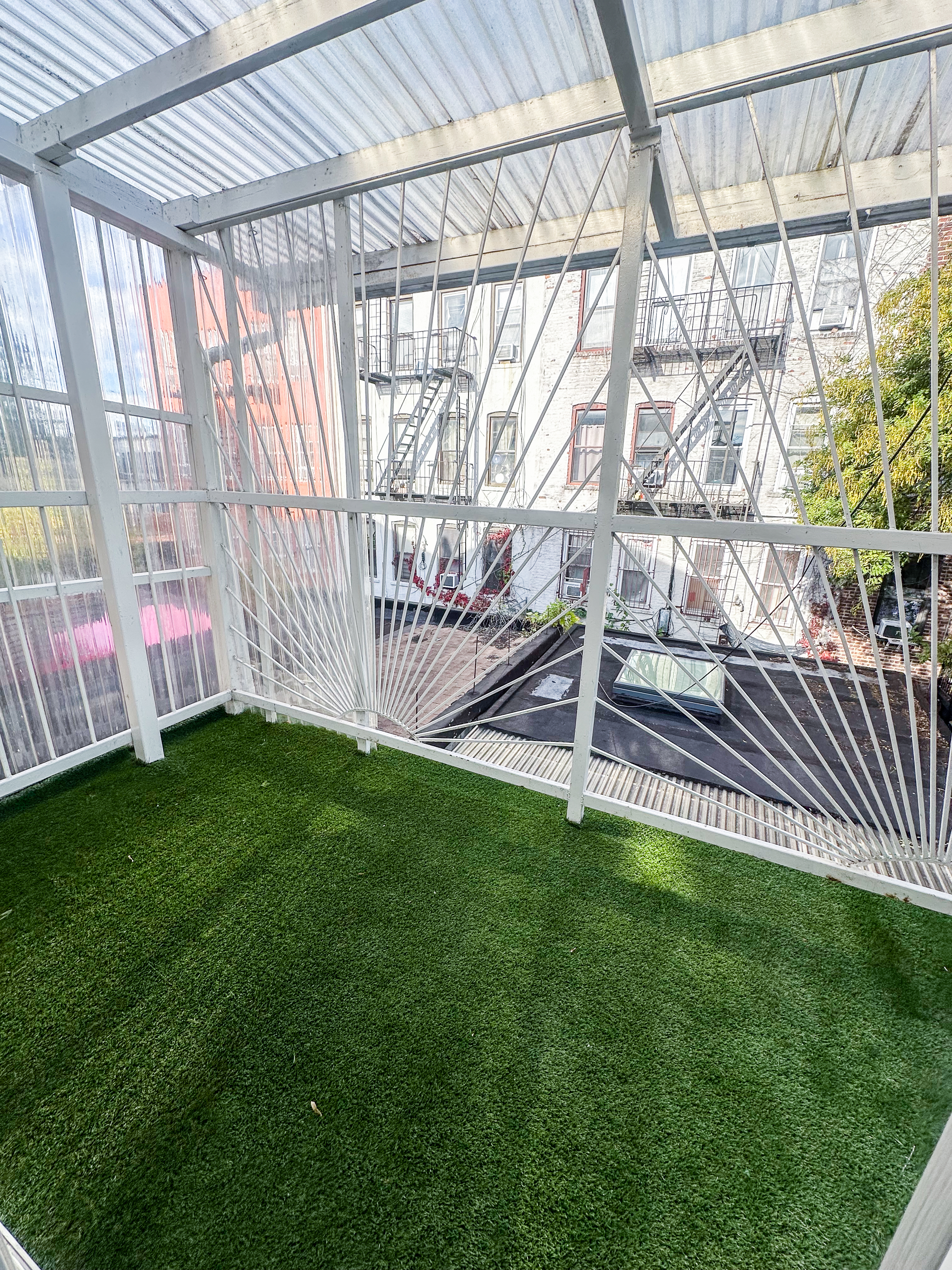 289 A Cooper Street, Unit 2 Brooklyn, NY 11237 - Photo 19 of 19 a garden view with a backyard