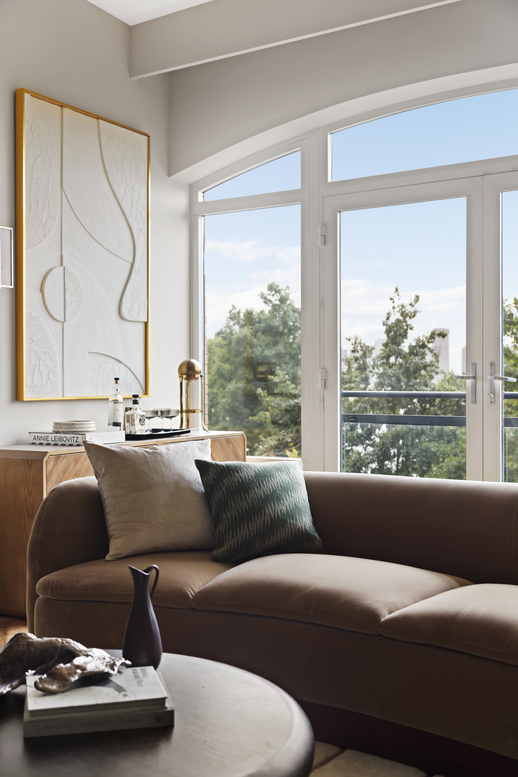 400 West 12th Street, Unit 4E Manhattan, NY 10014 - Photo 6 of 24 a living room with furniture and a window