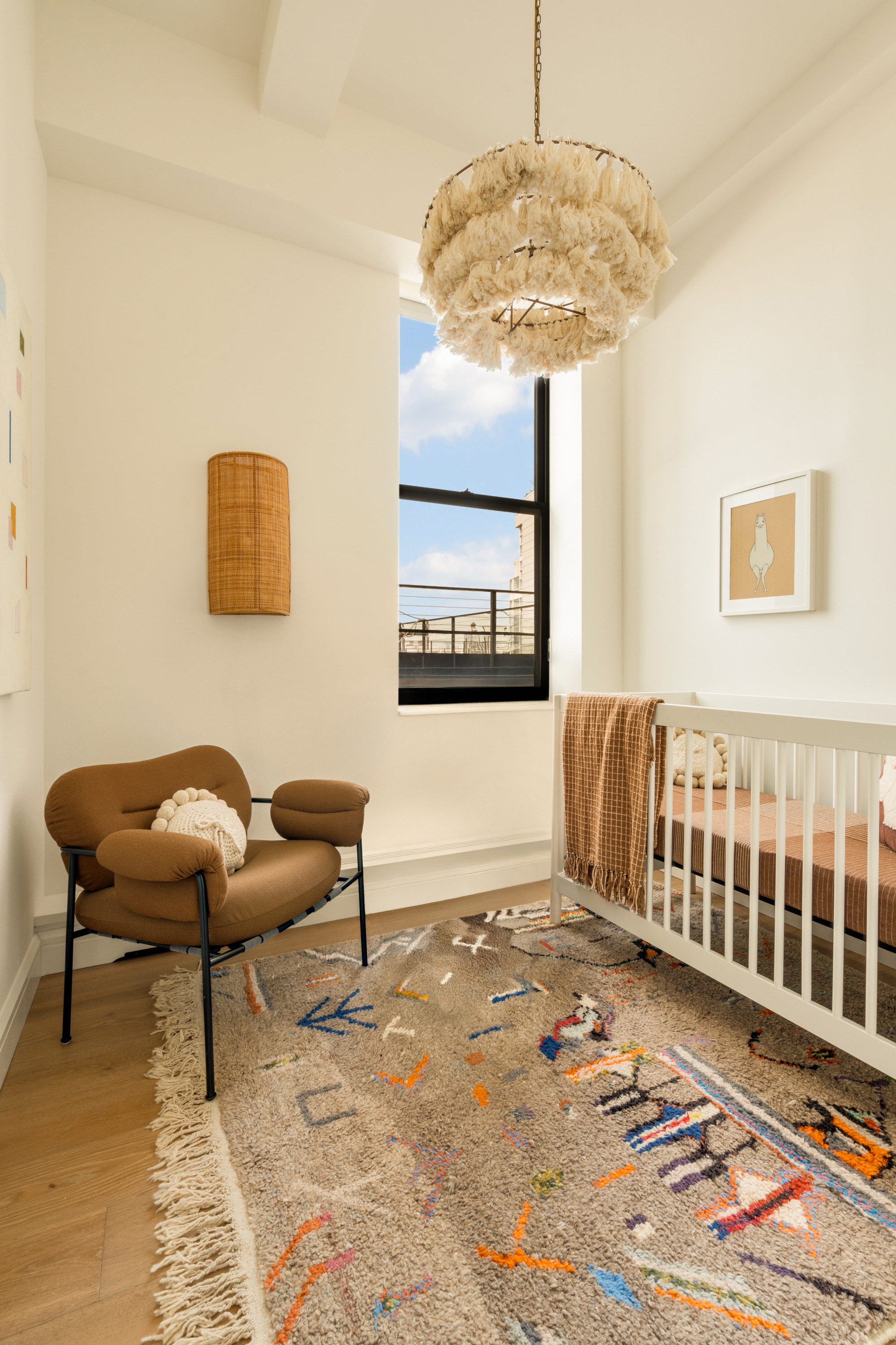 165 Perry Street, Unit 5A Manhattan, NY 10014 - Photo 11 of 14 a bedroom with furniture and a window