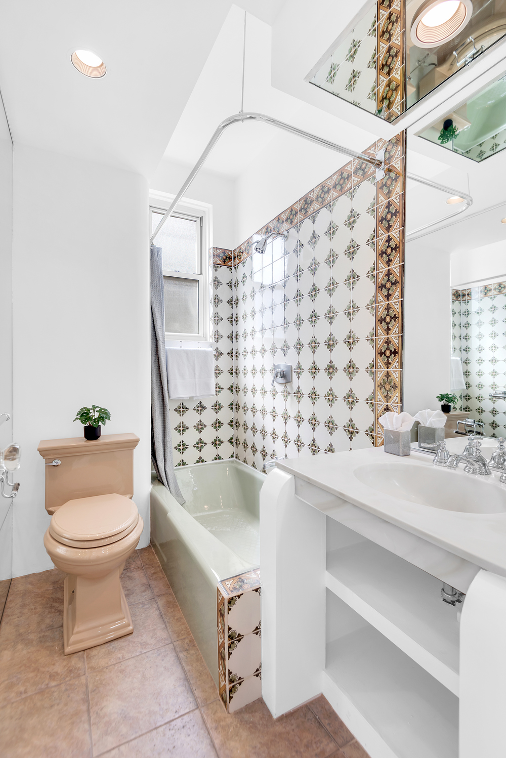 136 East 36th Street, Unit 11F Manhattan, NY 10016 - Photo 6 of 10 a bathroom with a sink toilet and shower
