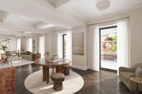 a living room with fireplace furniture and a large window