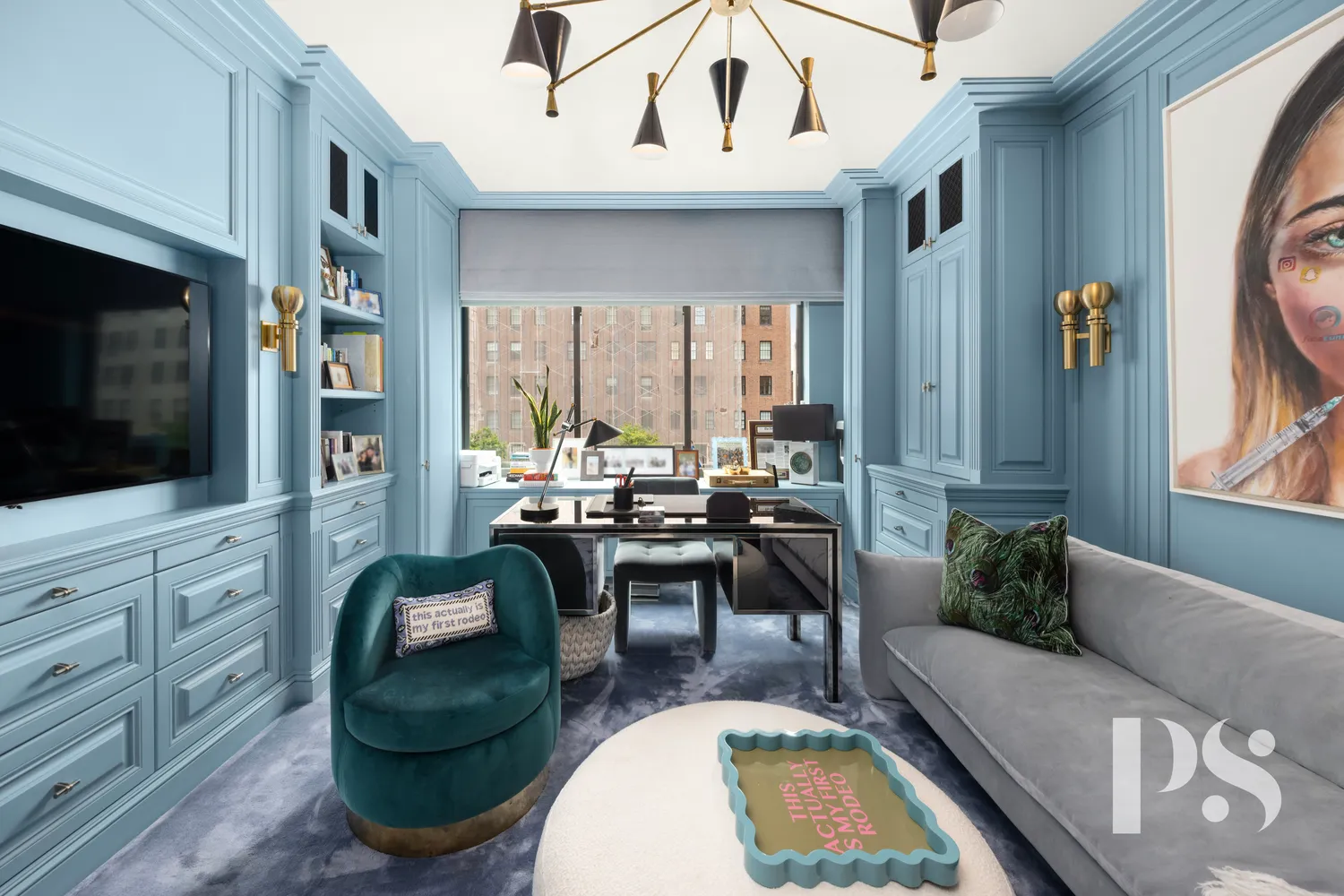 a living room with fireplace furniture and a flat screen tv