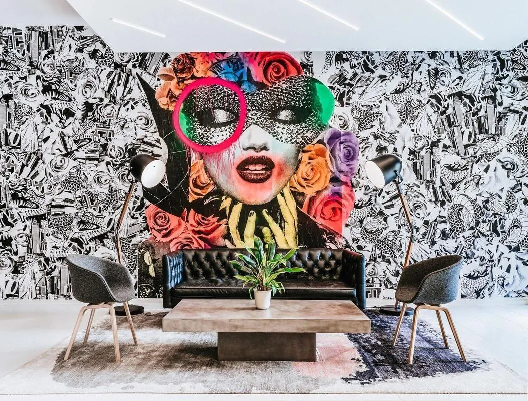 a street sign on a wall in front of building