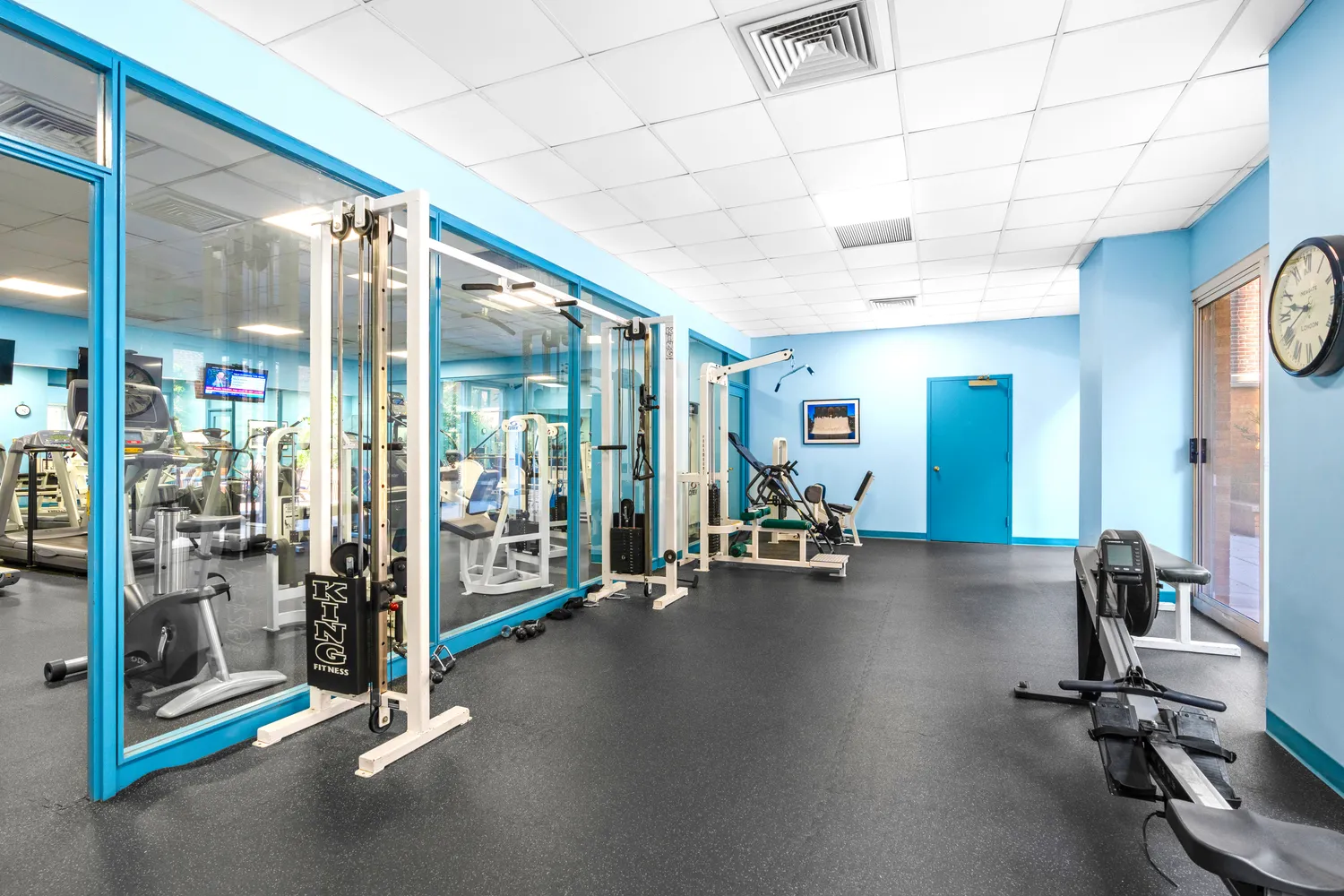 a view of a patio with table and chairs potted plants