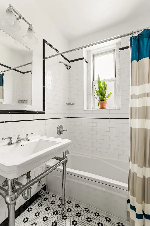 a bathroom with a sink and a bathtub