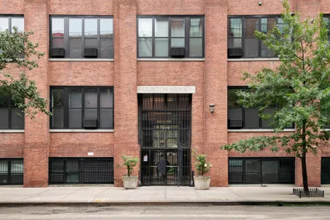 a front view of a house with garage