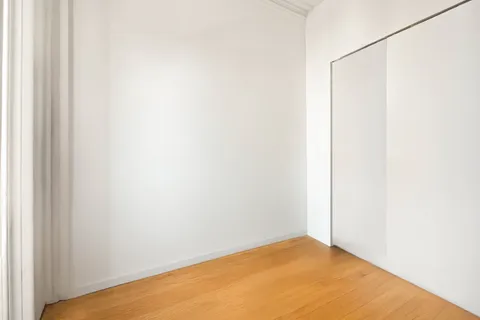 a kitchen with granite countertop cabinets stainless steel appliances and a sink