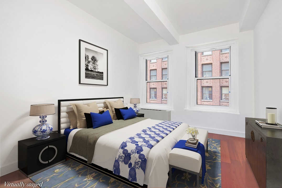 80 John Street, Unit 5G Manhattan, NY 10038 - Photo 4 of 8 a bedroom with bed and a window