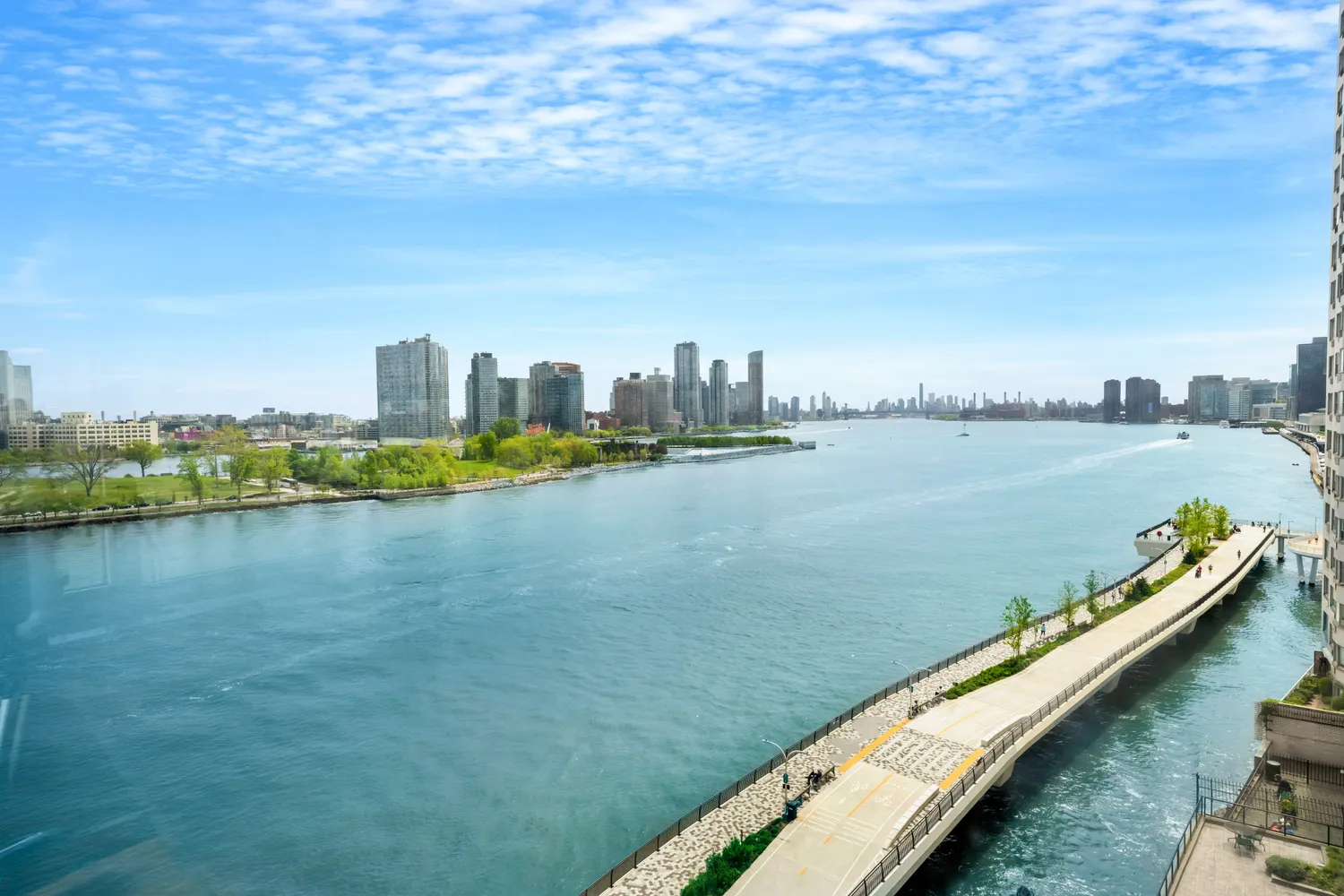 a view of a city with an ocean
