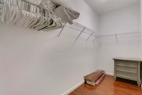 a view of a room with stairs and a rug