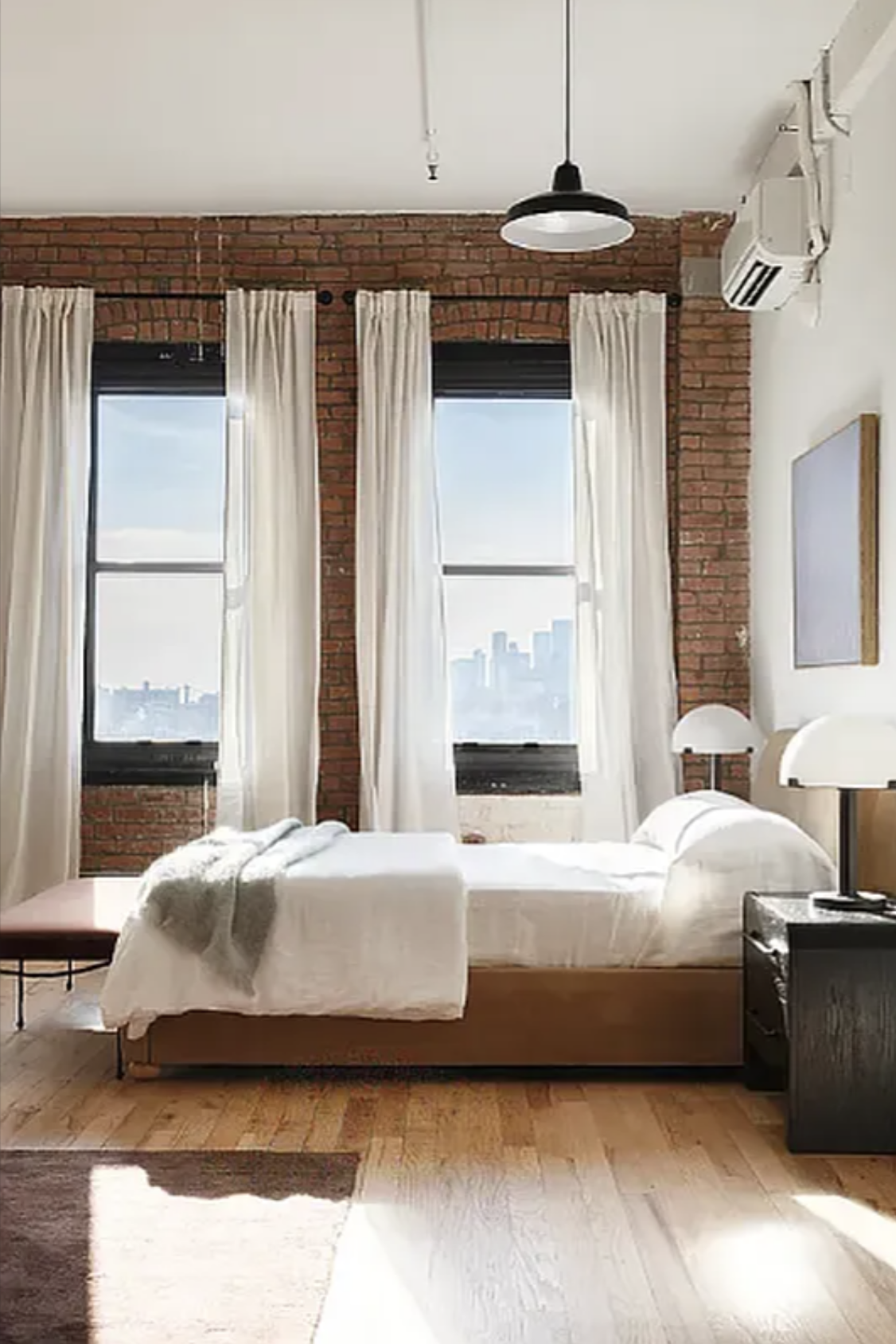 239 Banker Street Brooklyn, NY 11222 - Photo 4 of 11 a bedroom with a bed and a window