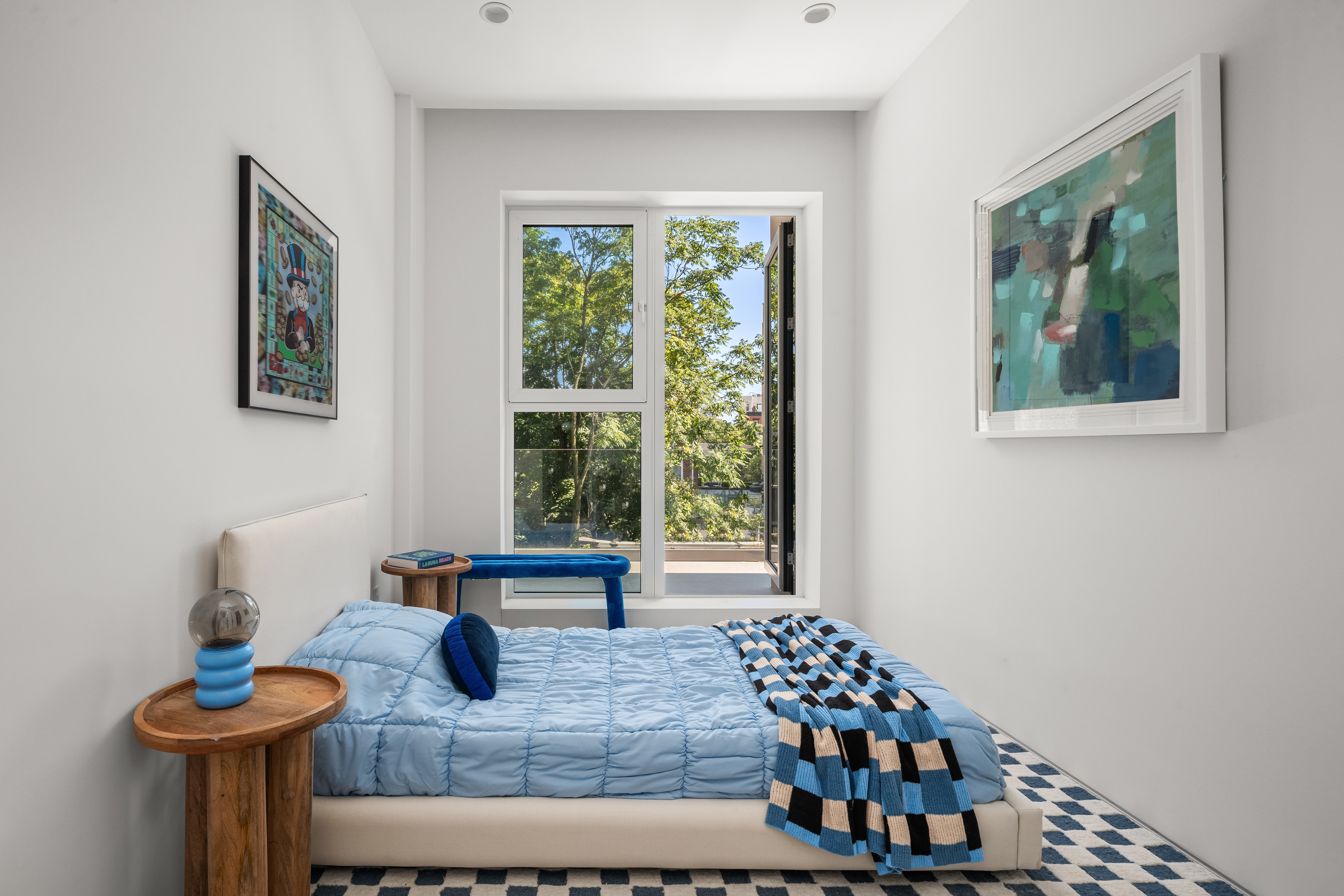 79 South 2nd Street, Unit 2 Brooklyn, NY 11249 - Photo 7 of 14 a bedroom with furniture and a window