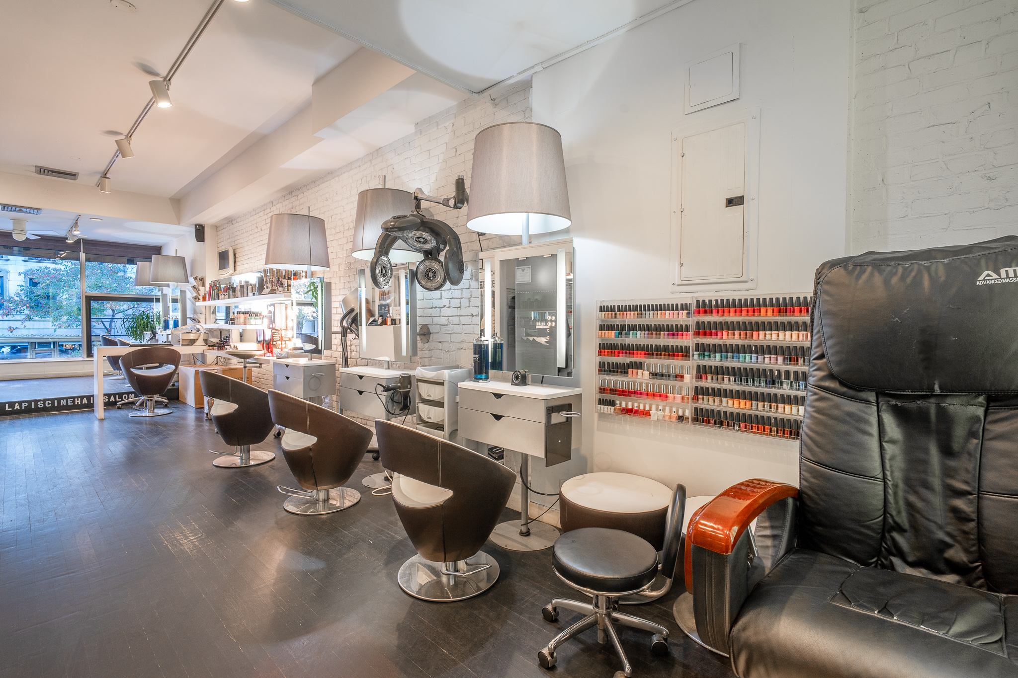 843 Lexington Avenue, Unit 2 Manhattan, NY 10065 - Photo 1 of 6 a room with stainless steel appliances kitchen island granite countertop a stove and white cabinets