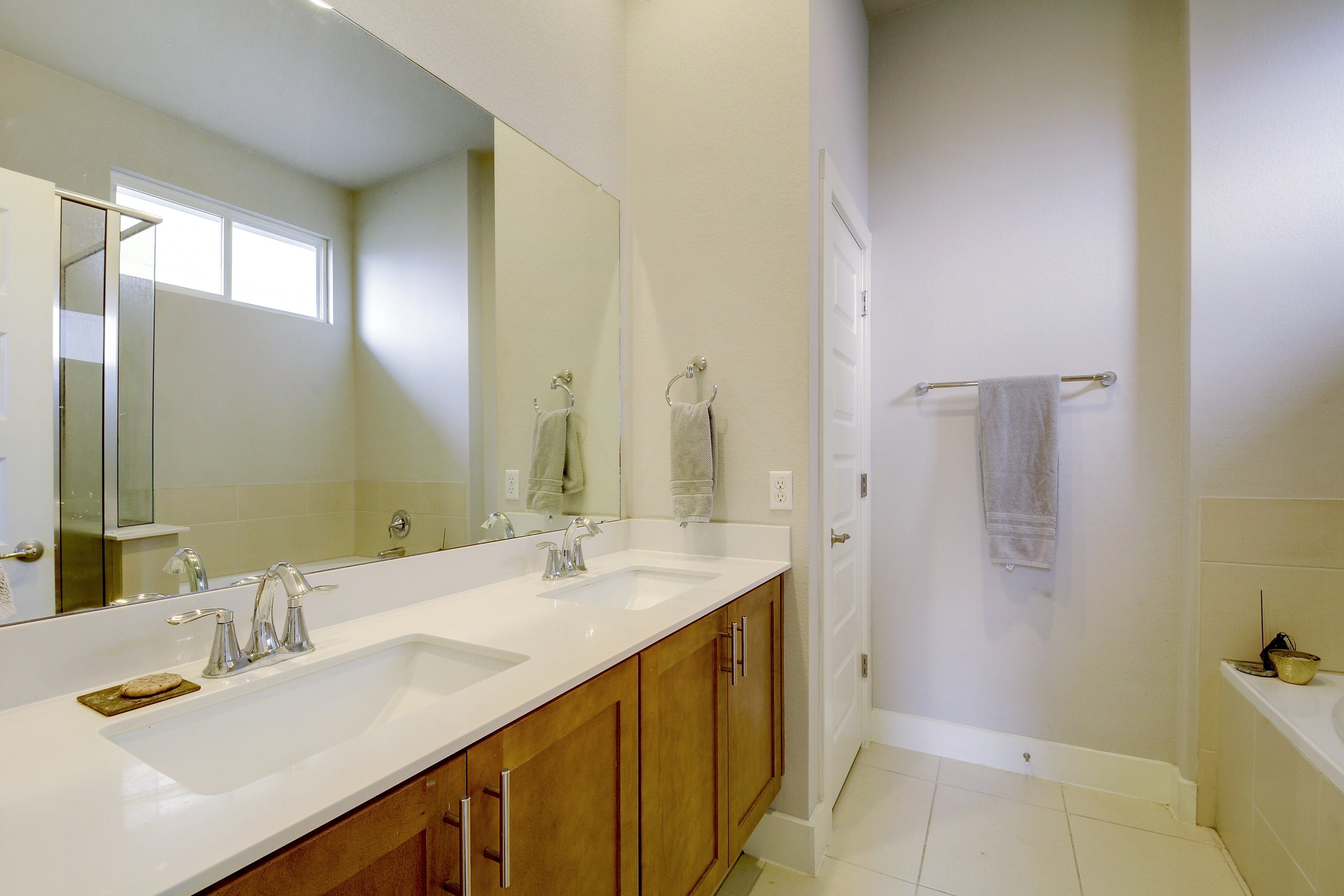 5400 Daimler Drive Austin, TX 78744 - Photo 15 of 27 a bathroom with a sink a toilet and shower
