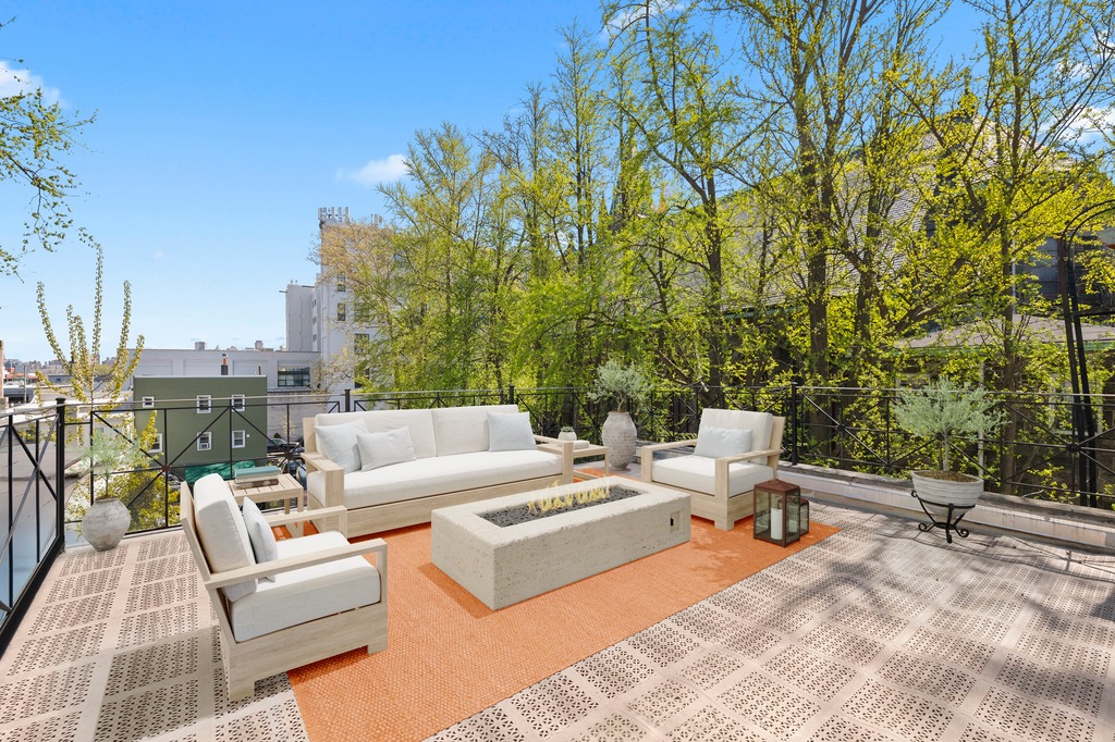 82 Visitation Place, Unit 2 Brooklyn, NY 11231 - Photo 9 of 12 a view of a terrace with couches and a table and chairs