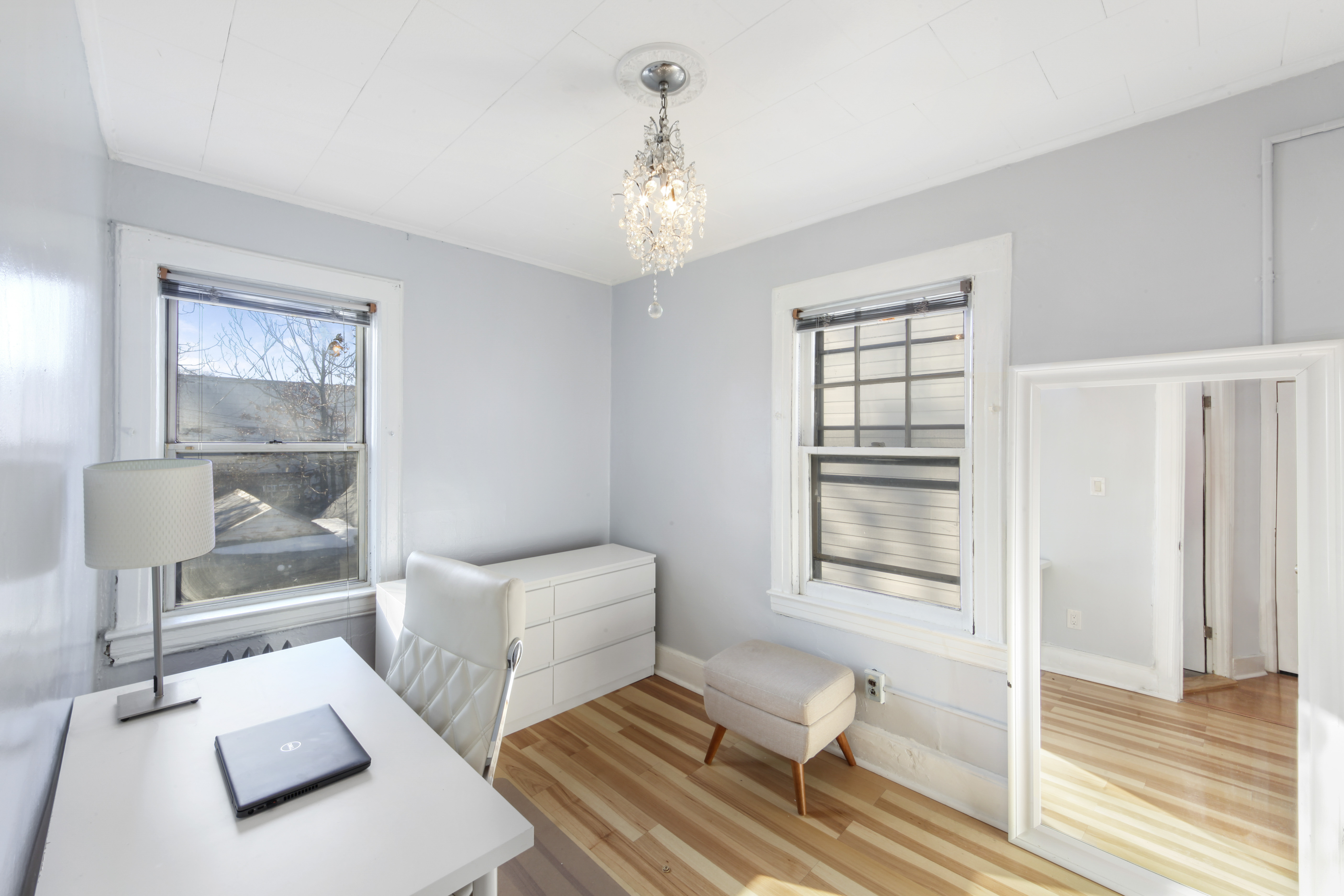 1530 East 51st Street Brooklyn, NY 11234 - Photo 6 of 14 a living room with furniture and a window