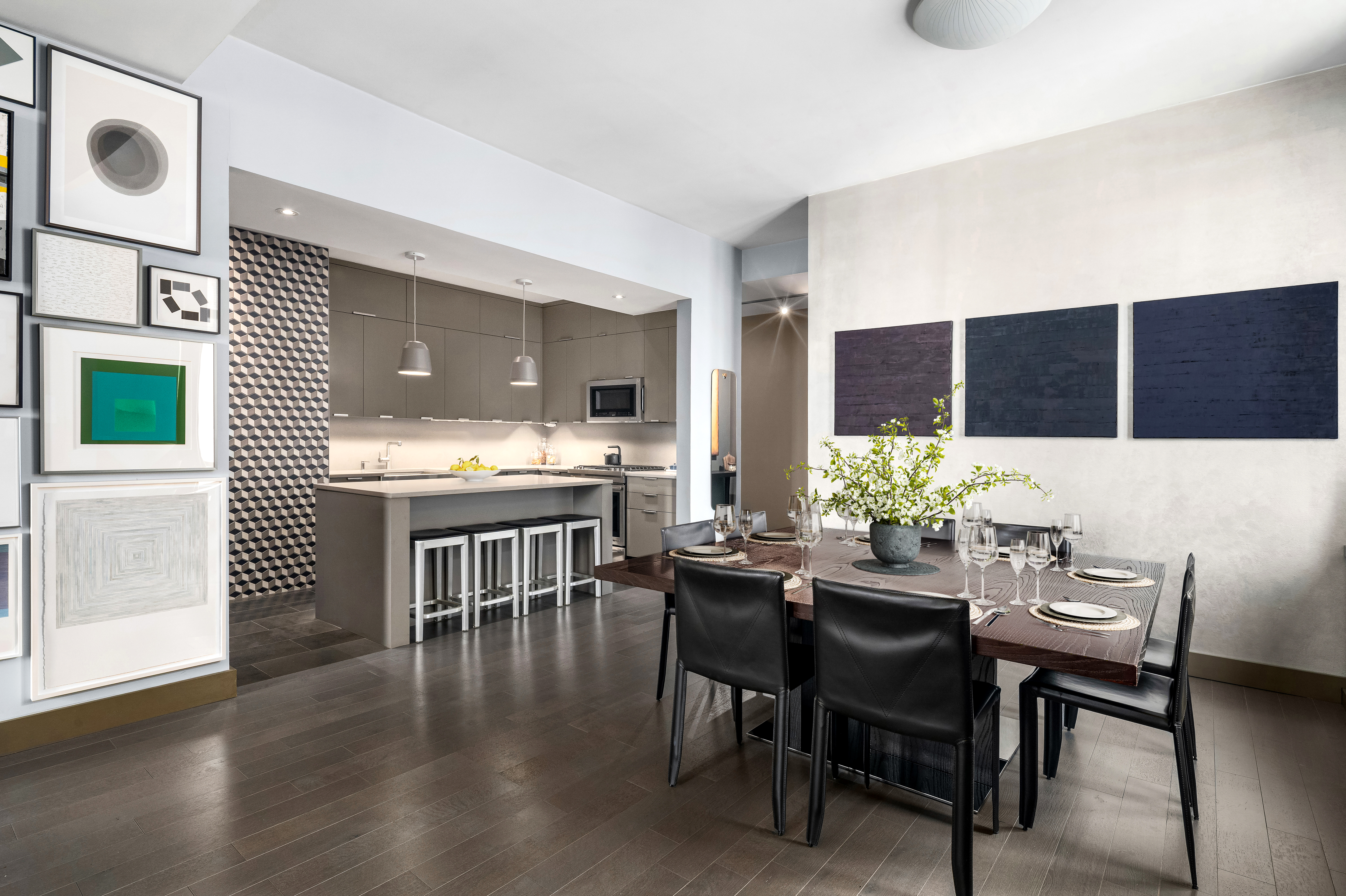 252 7th Avenue, Unit 9D Manhattan, NY 10001 - Photo 7 of 23 a view of a dining room with furniture and wooden floor