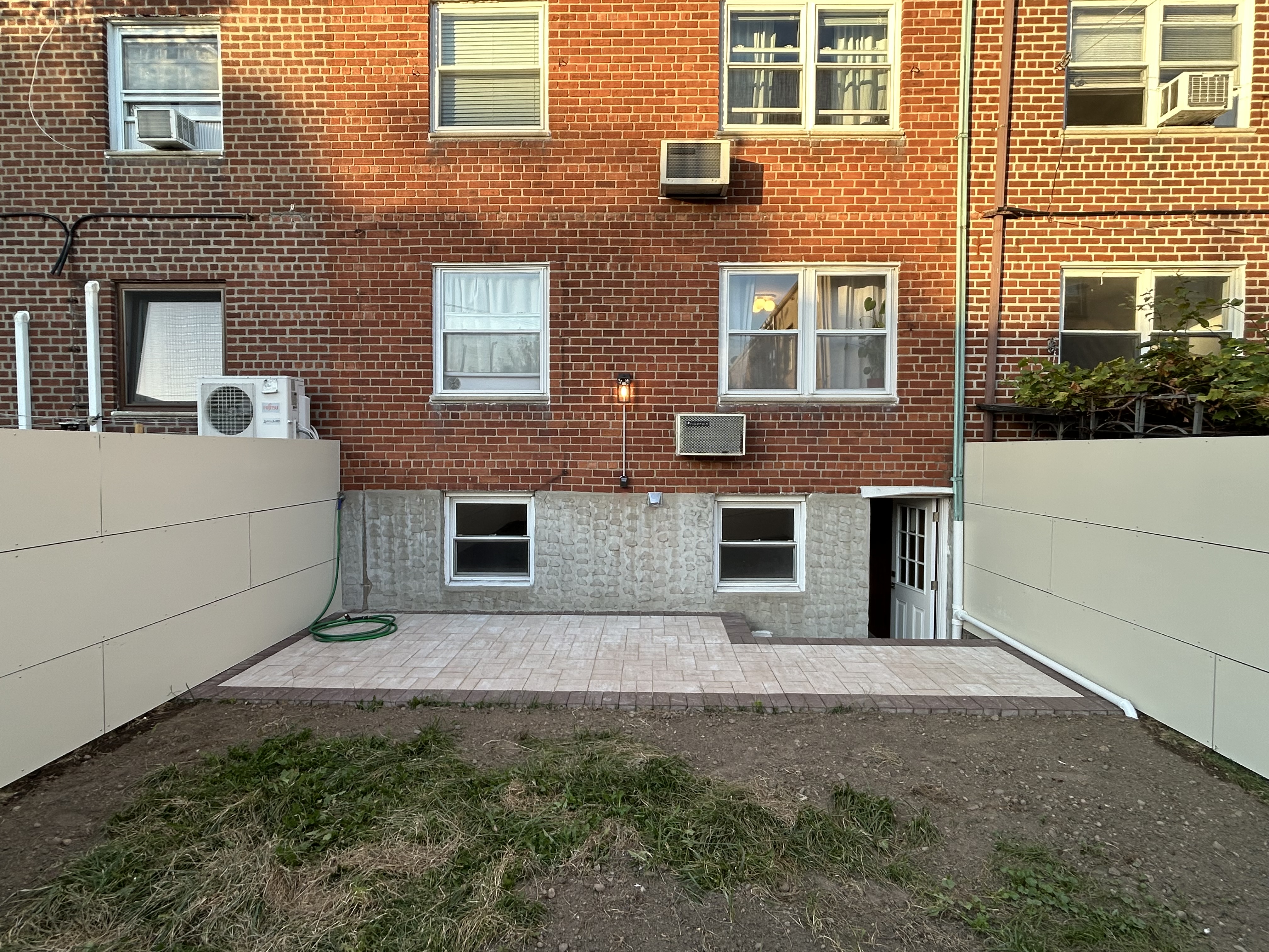 a front view of a house with yard