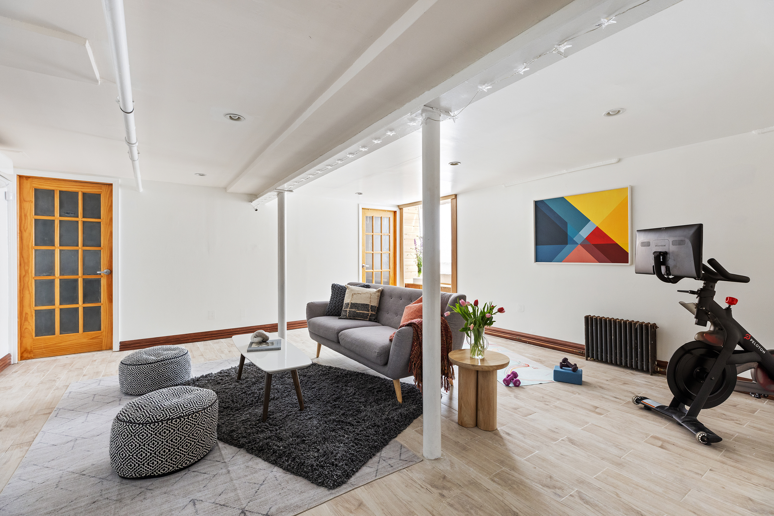 412 Classon Avenue Brooklyn, NY 11238 - Photo 10 of 30 a living room with furniture and wooden floor