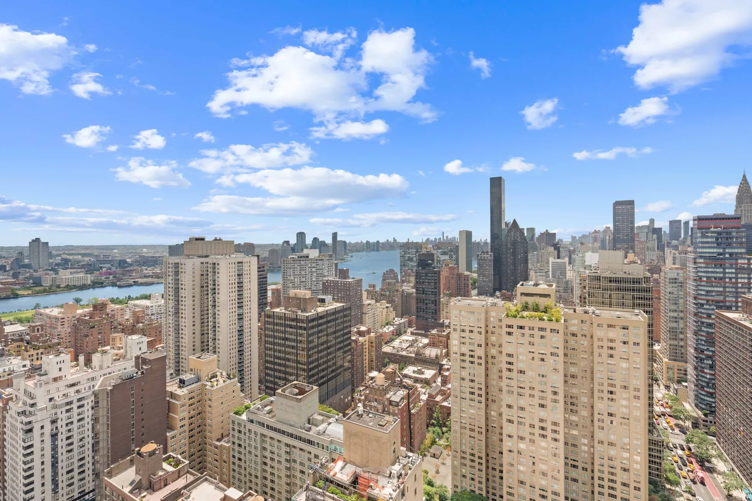 a view of a city with tall buildings