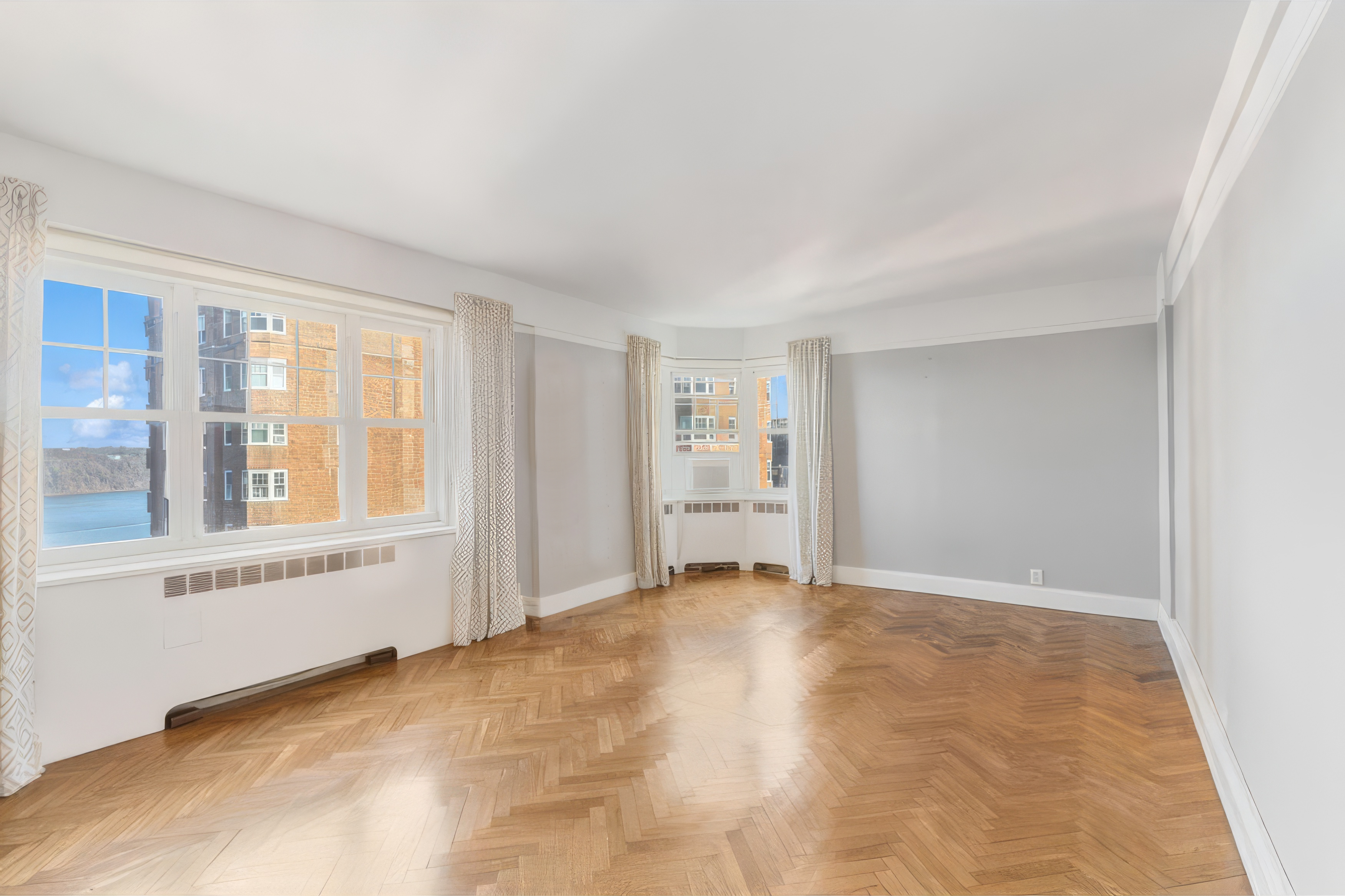 120 Cabrini Boulevard, Unit 107 Manhattan, NY 10033 - Photo 2 of 26 a view of an empty room with a window