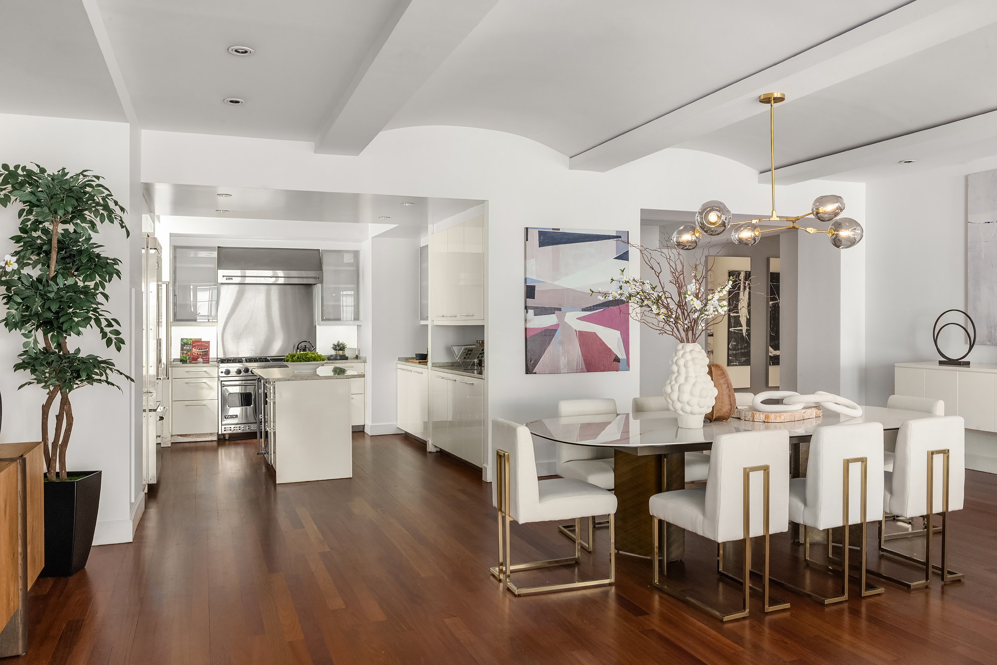 43 West 64th Street, Unit 7A Manhattan, NY 10023 - Photo 7 of 20 a view of a dining room with furniture and wooden floor