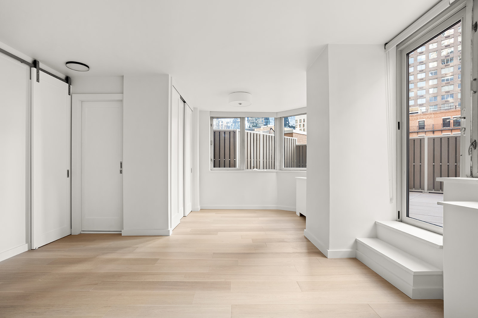 500 West 43rd Street, Unit 3B Manhattan, NY 10036 - Photo 9 of 19 a view of a room with a white walls